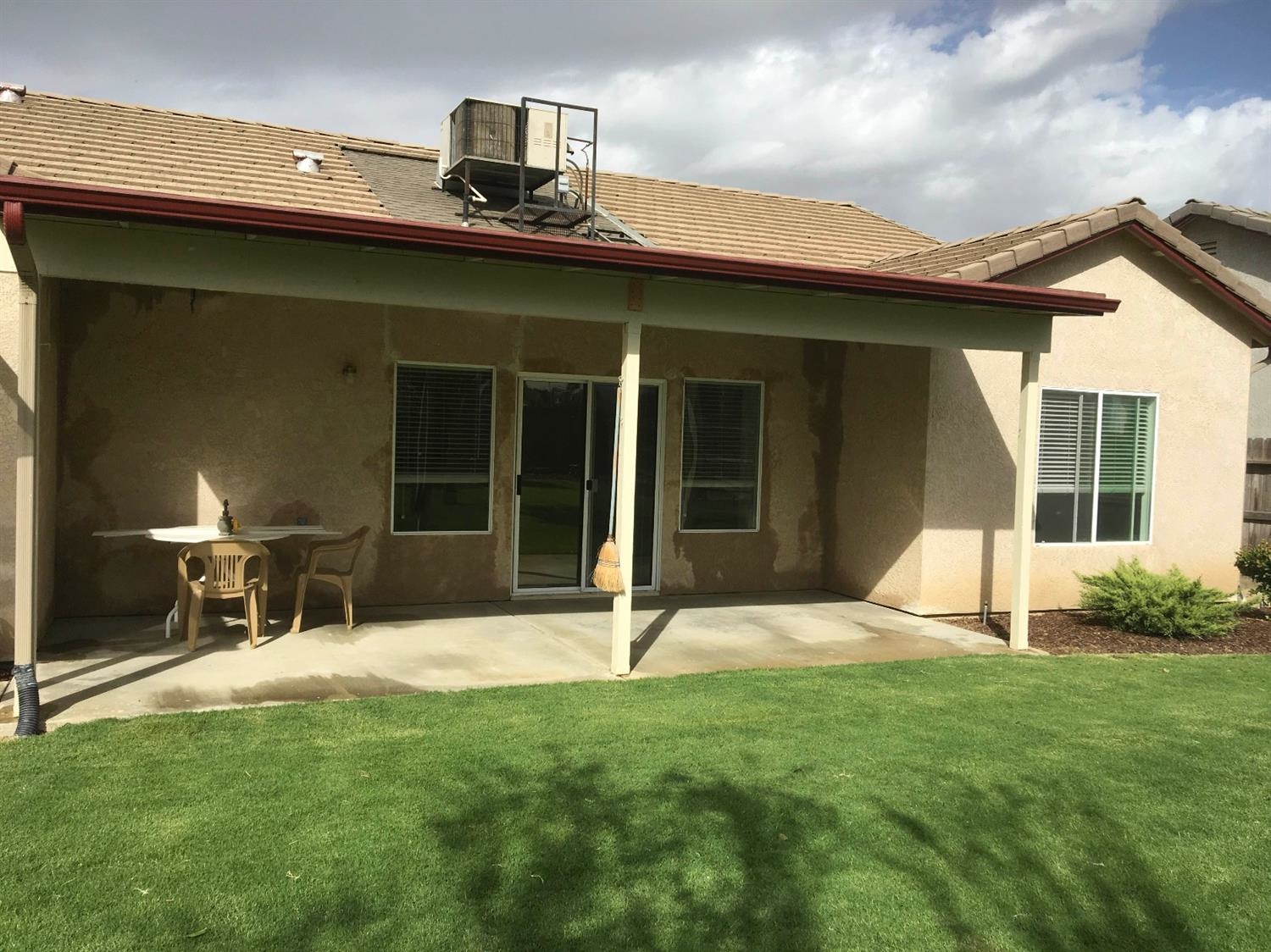 979 Maple Avenue Fowler, CA 93625 - Photo 5 of 10 a view of a house with yard and sitting area