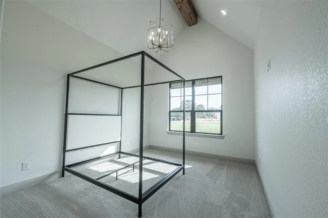 a bathroom with a granite countertop sink a toilet and a mirror