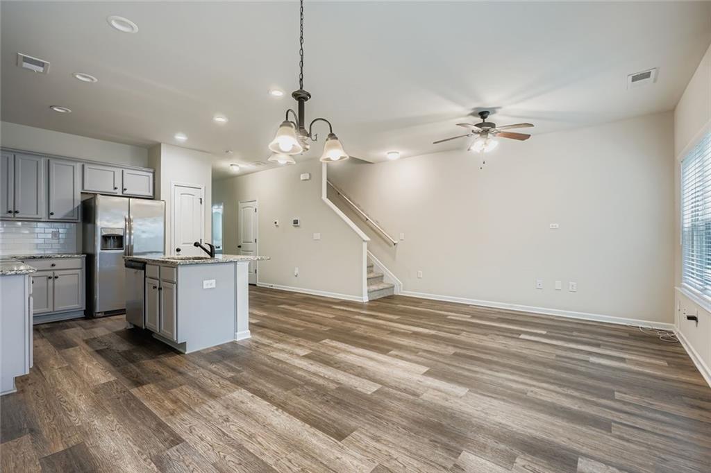 1901 Creel Lane Atlanta, GA 30349 - Photo 5 of 28 a view of a kitchen with a sink and cabinet