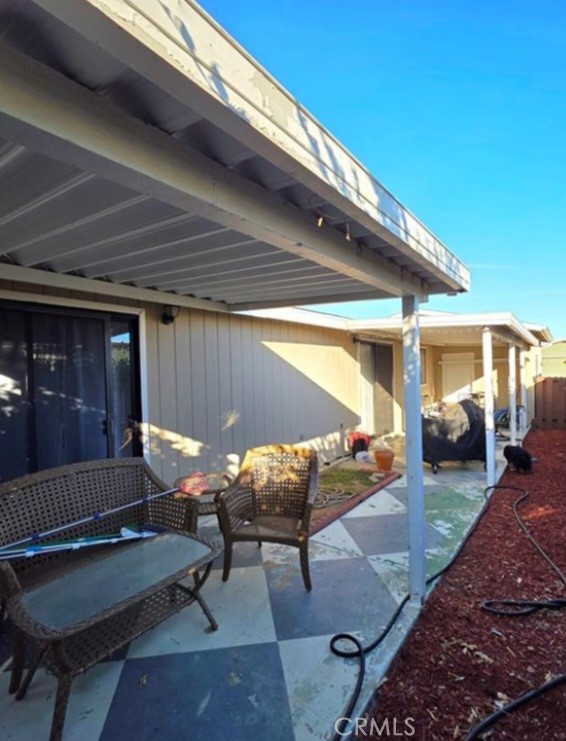27250 Murrieta Road, Unit 390 Menifee, CA 92586 - Photo 27 of 30 a outdoor space with patio furniture