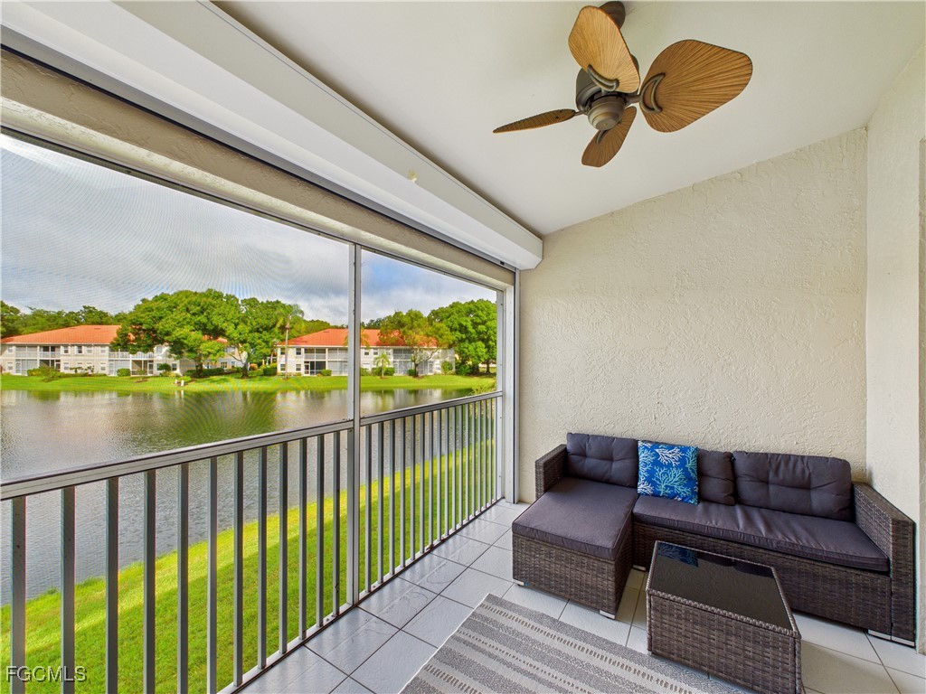 7435 Plumbago Bridge Road, Unit K201 Naples, FL 34109 - Photo 21 of 35 a view of a chairs in a balcony