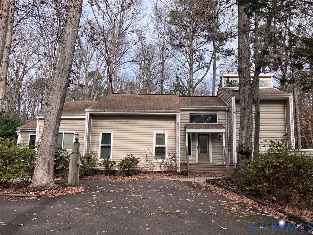3901 McTyres Cove Court Midlothian, VA 23112 - Photo 1 of 11 a front view of a house with garden