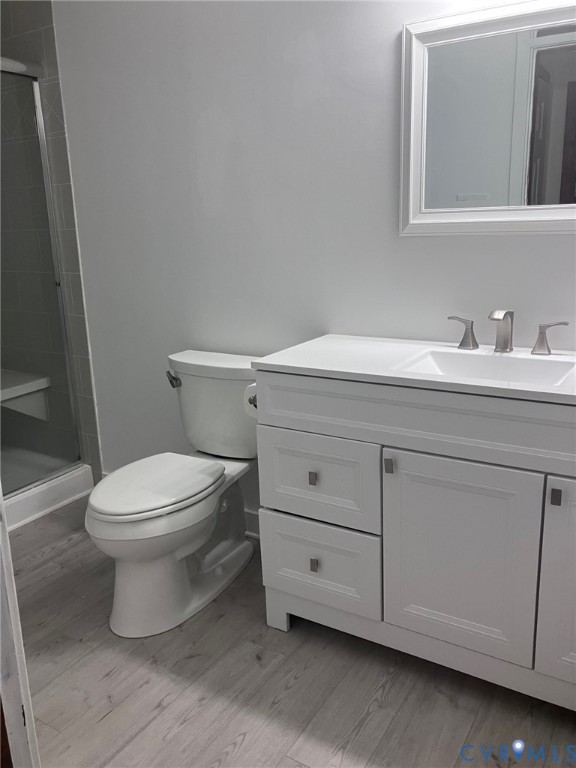 3901 McTyres Cove Court Midlothian, VA 23112 - Photo 9 of 11 a bathroom with a toilet sink and vanity