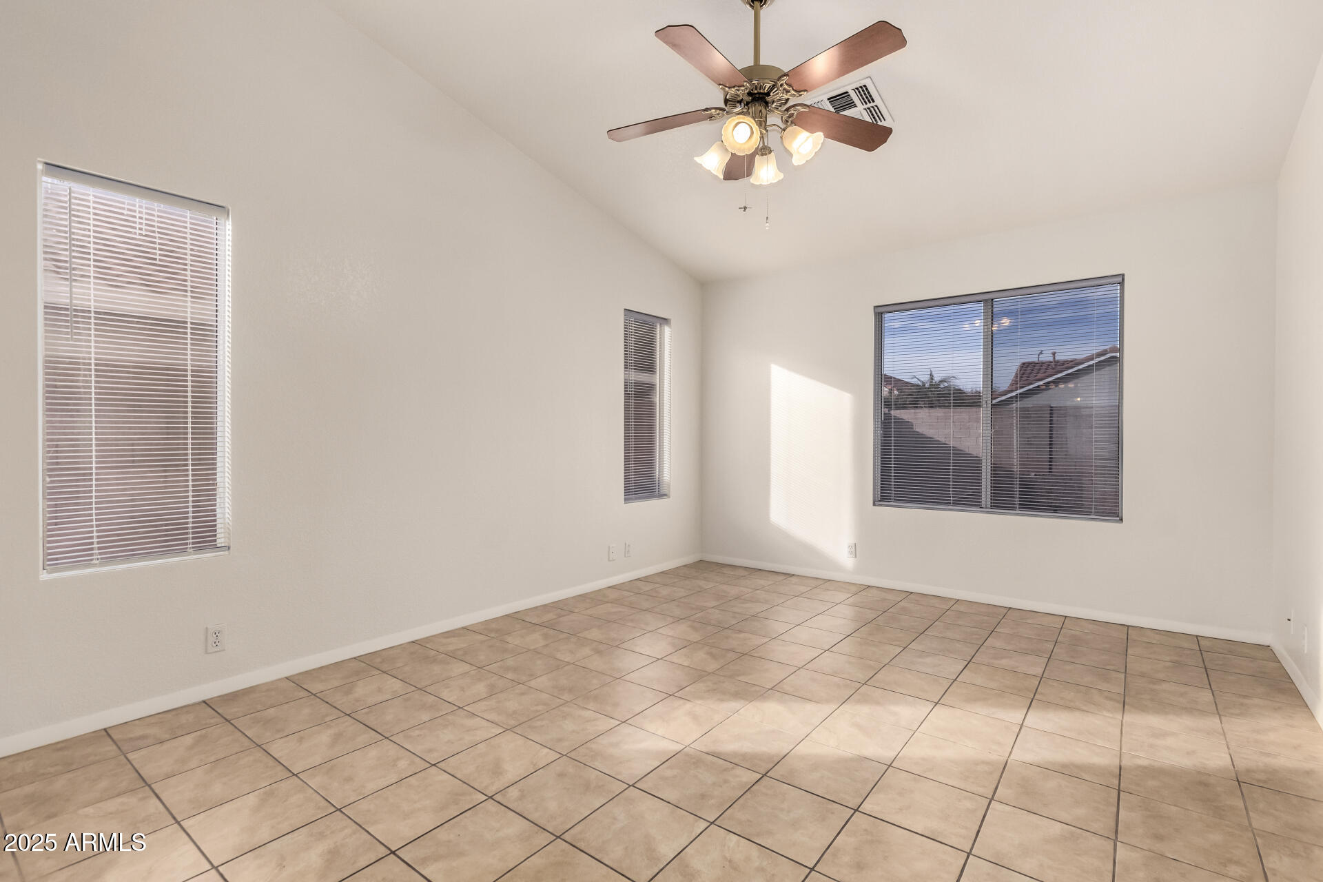 4010 West Wethersfield Road Phoenix, AZ 85029 - Photo 19 of 43 a view of an empty room and window