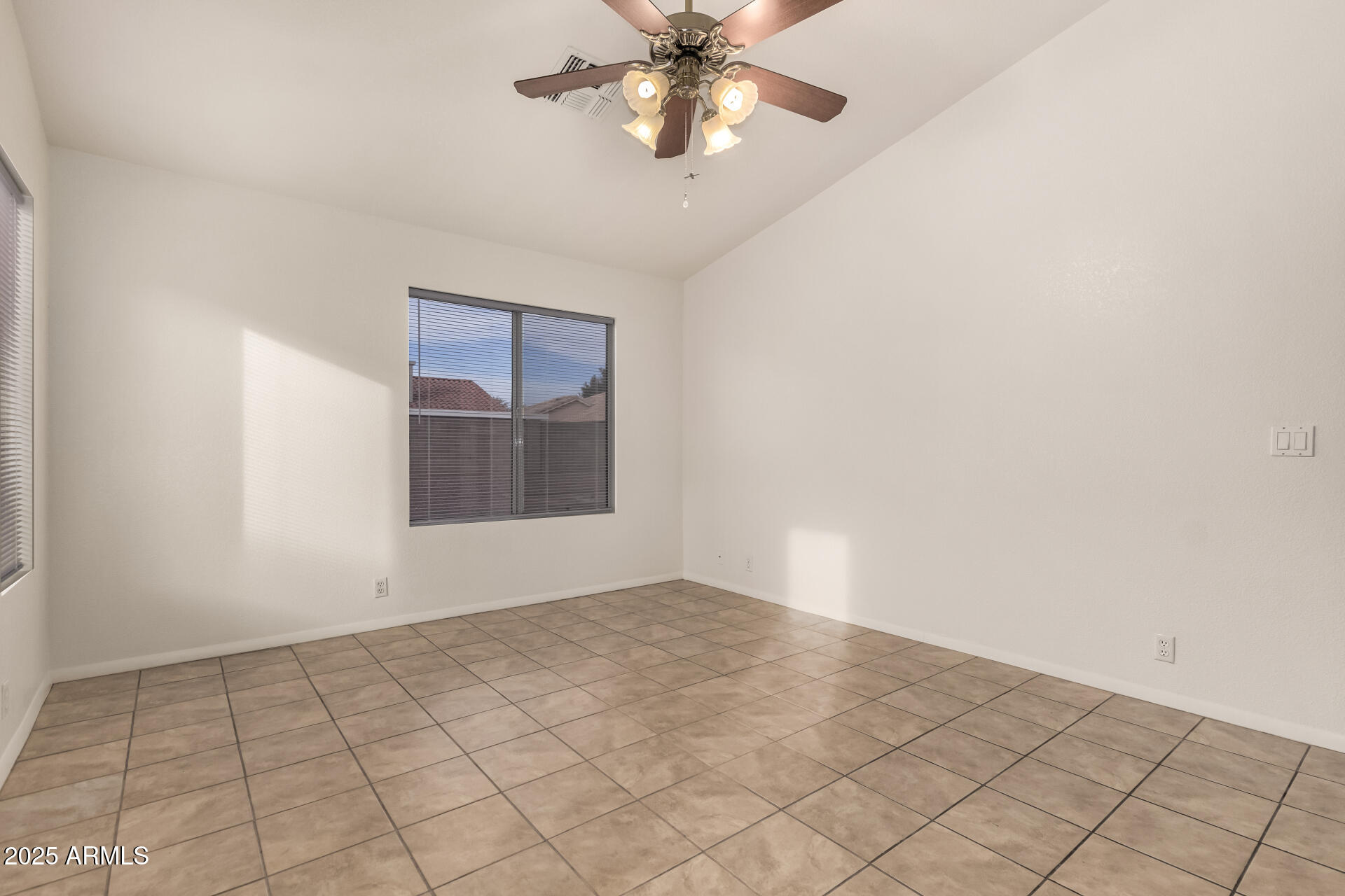 4010 West Wethersfield Road Phoenix, AZ 85029 - Photo 21 of 43 a view of an empty room and window