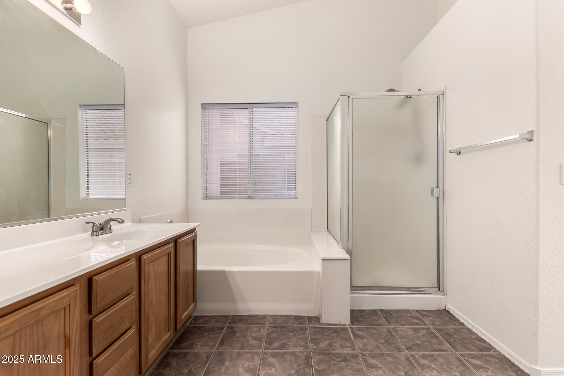 4010 West Wethersfield Road Phoenix, AZ 85029 - Photo 23 of 43 a bathroom with a tub sink and mirror
