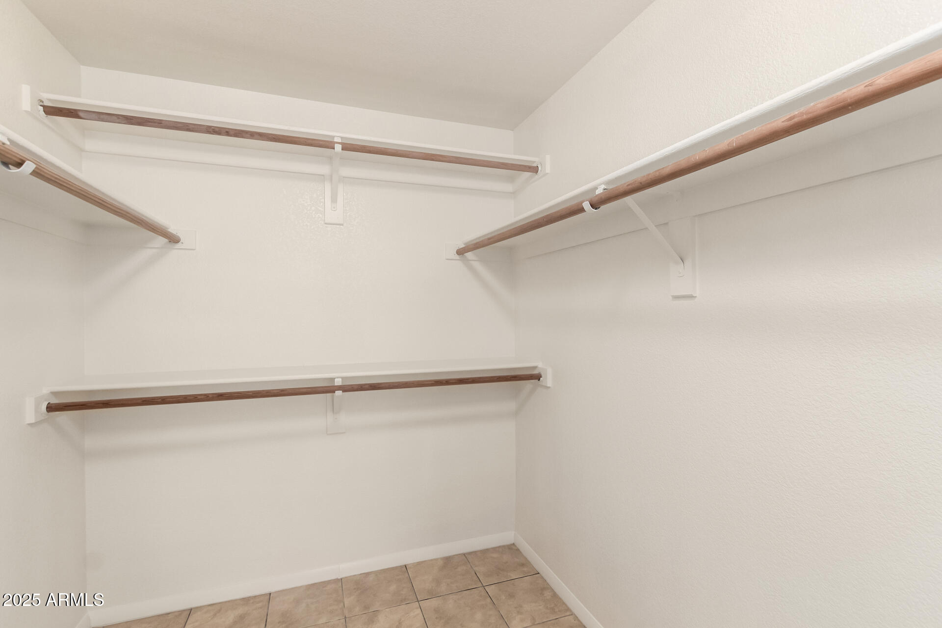 4010 West Wethersfield Road Phoenix, AZ 85029 - Photo 24 of 43 a view of a room with racks on the wall