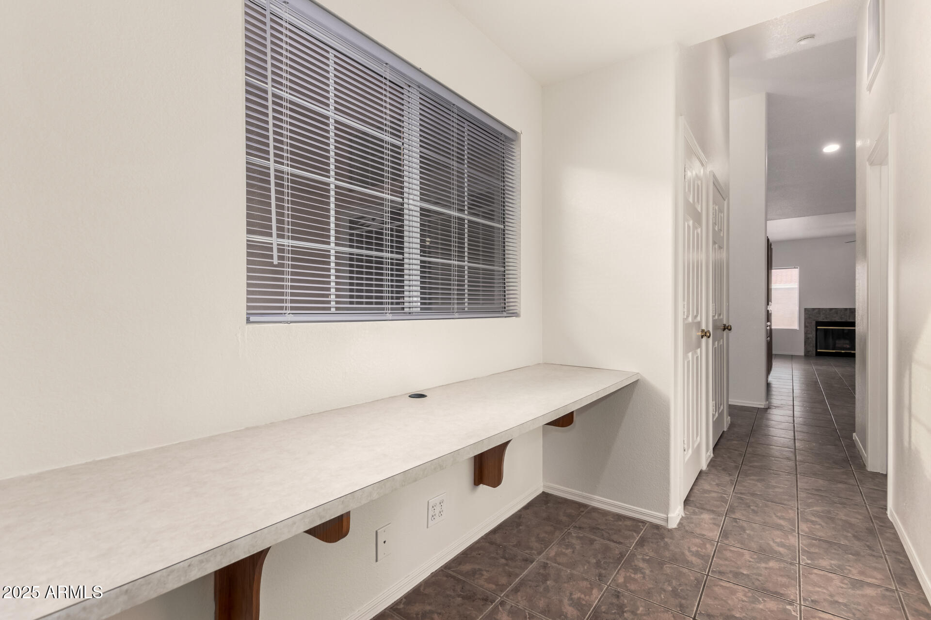4010 West Wethersfield Road Phoenix, AZ 85029 - Photo 32 of 43 a view of an empty room with a window