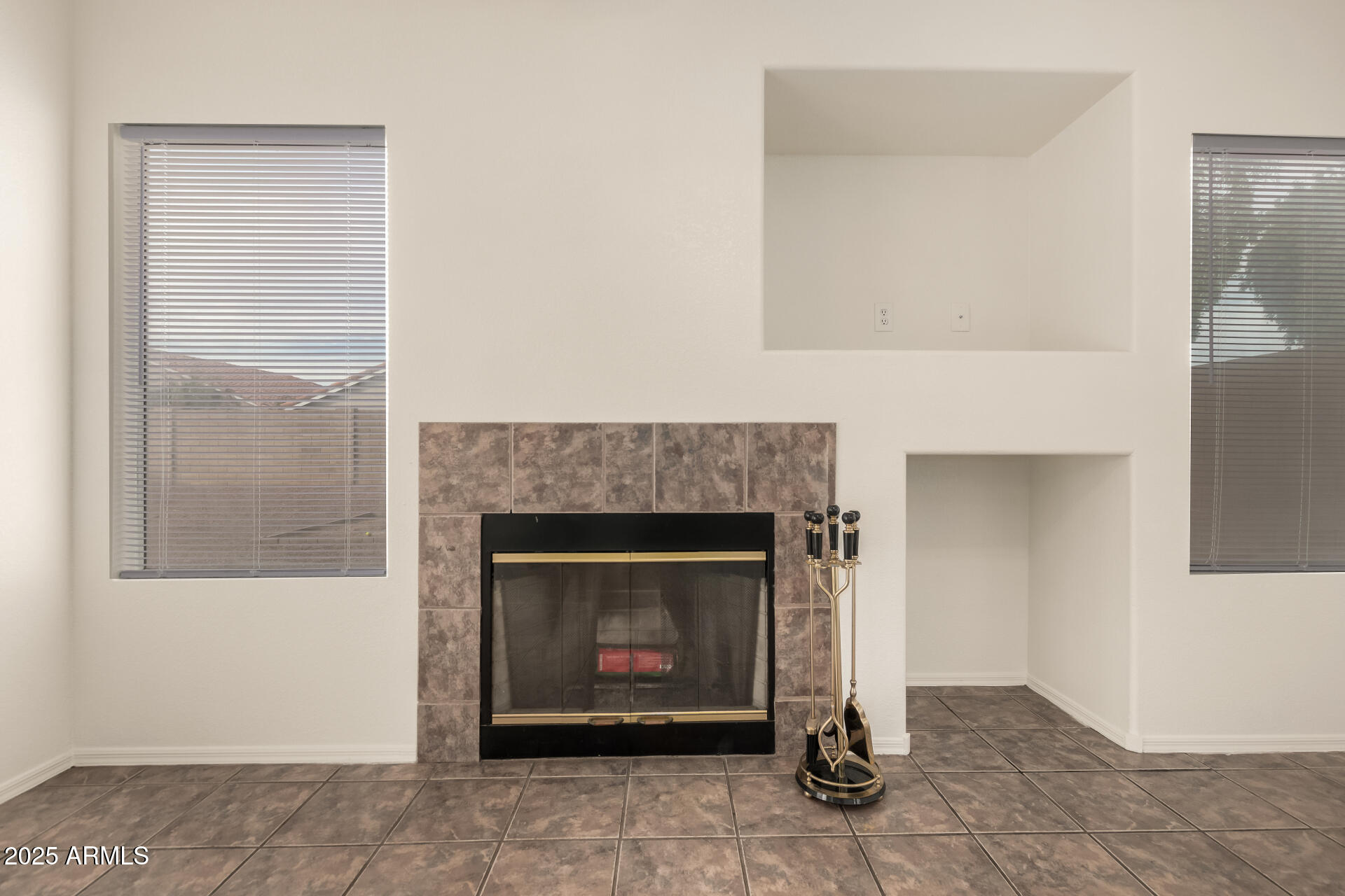 4010 West Wethersfield Road Phoenix, AZ 85029 - Photo 7 of 43 a living room with a fireplace