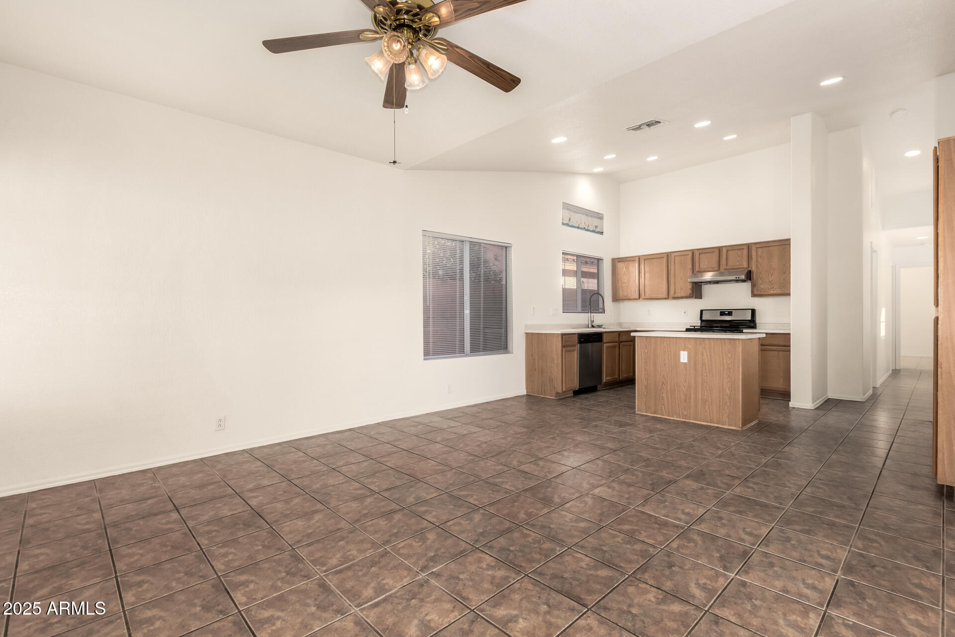4010 West Wethersfield Road Phoenix, AZ 85029 - Photo 9 of 43 a view of a kitchen with a sink and microwave