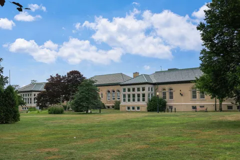 a view of a house with a big yard
