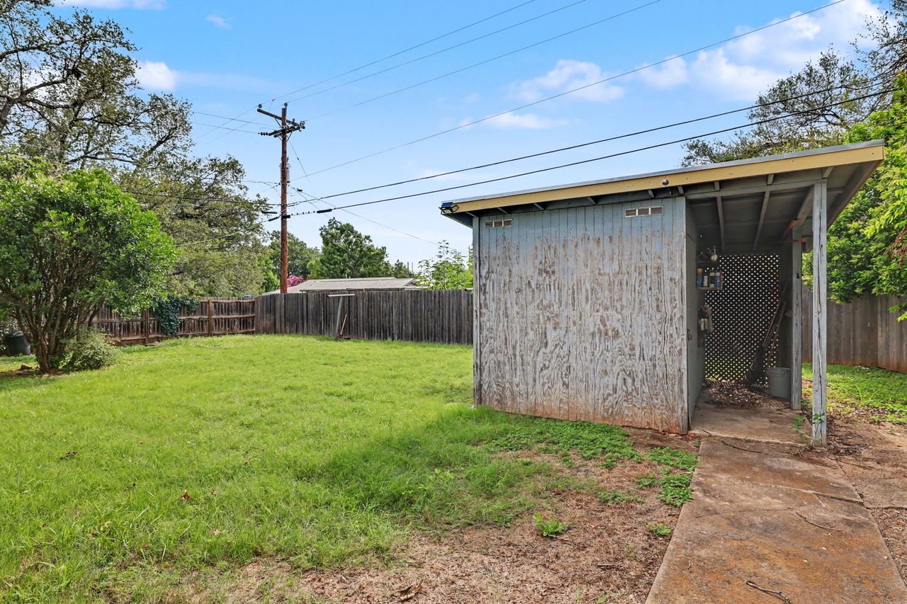 1811 Terry Lane Georgetown, TX 78628 - Photo 38 of 40 A generous backyard offers a detached storage shed and ample space for outdoor activities.