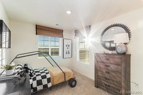 a bed room with a bed and a window