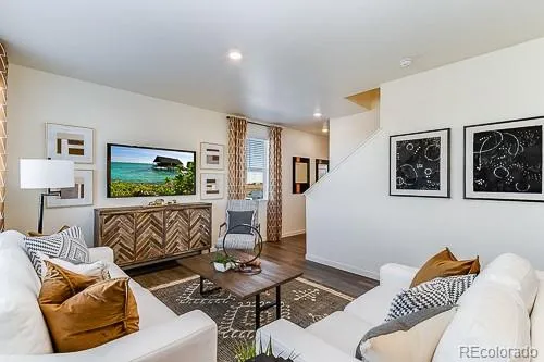 a living room with furniture and a couch