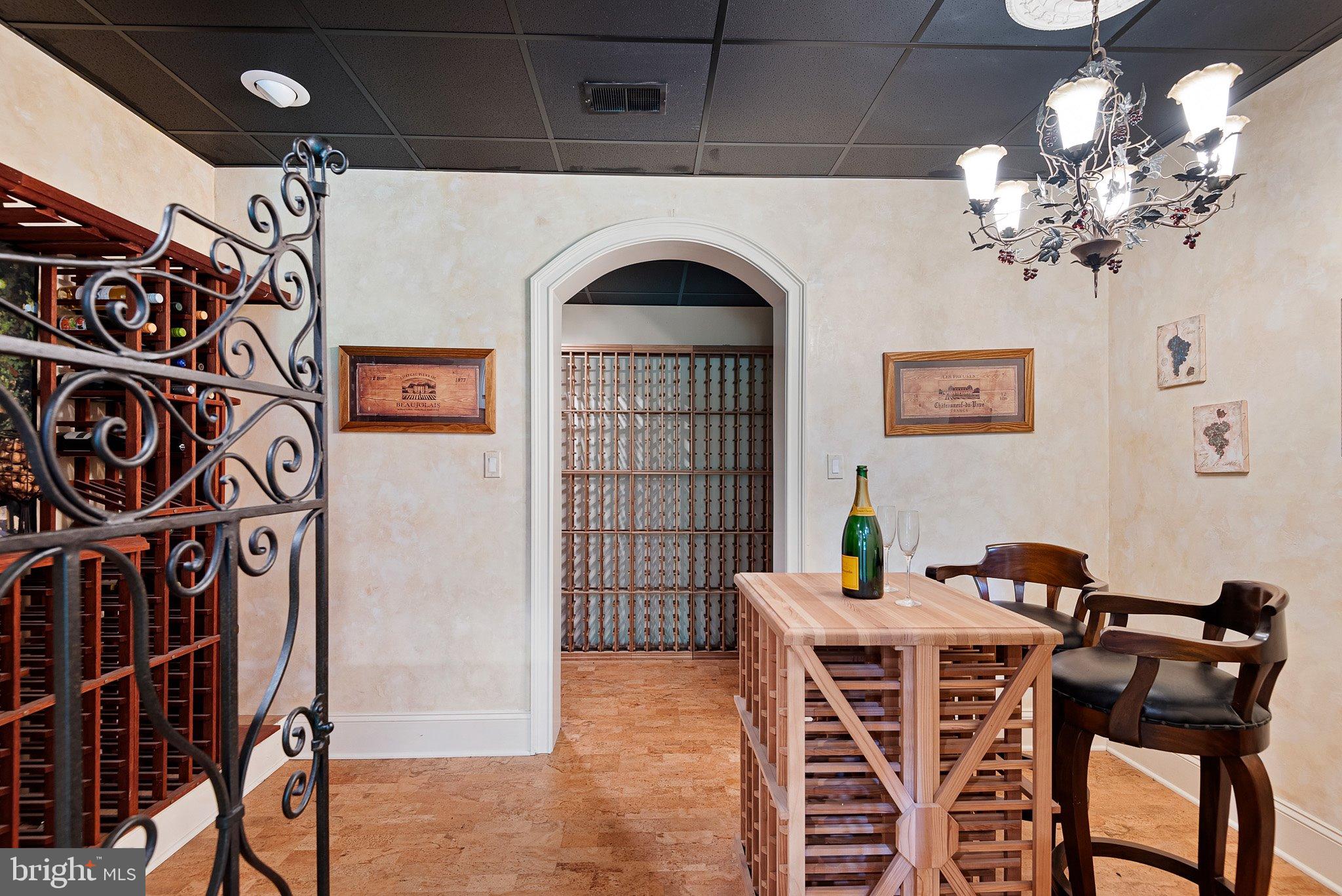104 Timber Ridge Lane Chadds Ford, PA 19317 - Photo 56 of 65 a view of a dining room with furniture wooden floor and a chandelier