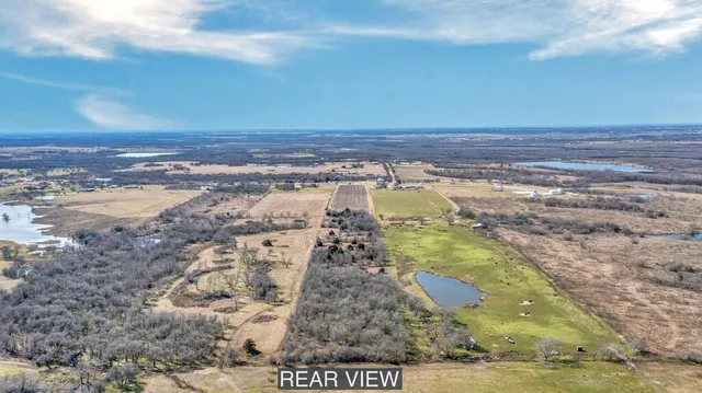a view of a swimming pool and an ocean view