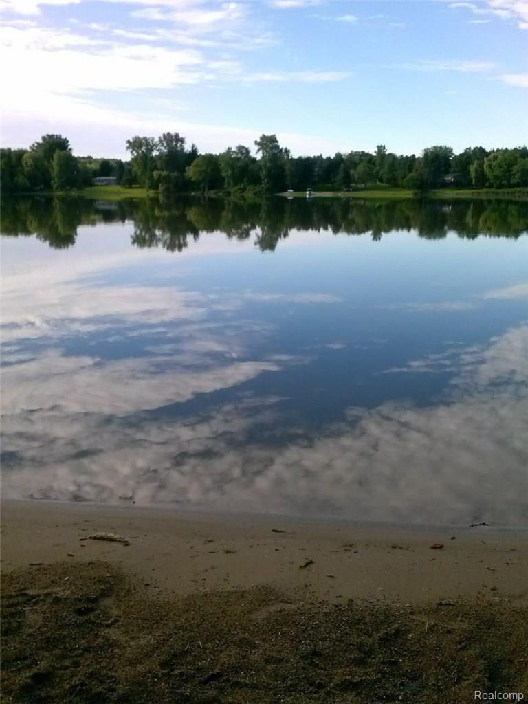 913 Woodruff Lake Road Highland, MI 48357 - Photo 9 of 31 9 Beach.JPG