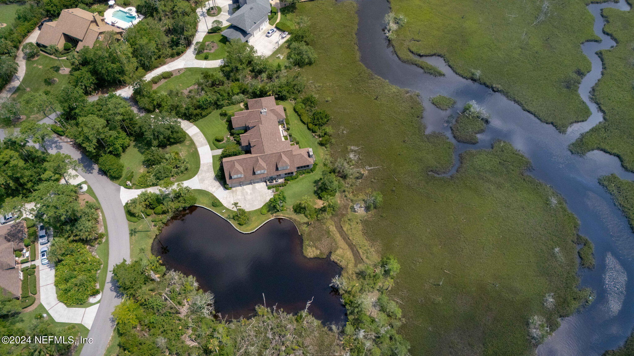 24629 Deer Trace Drive Ponte Vedra Beach, FL 32082 - Photo 13 of 45 an aerial view of a house with a yard