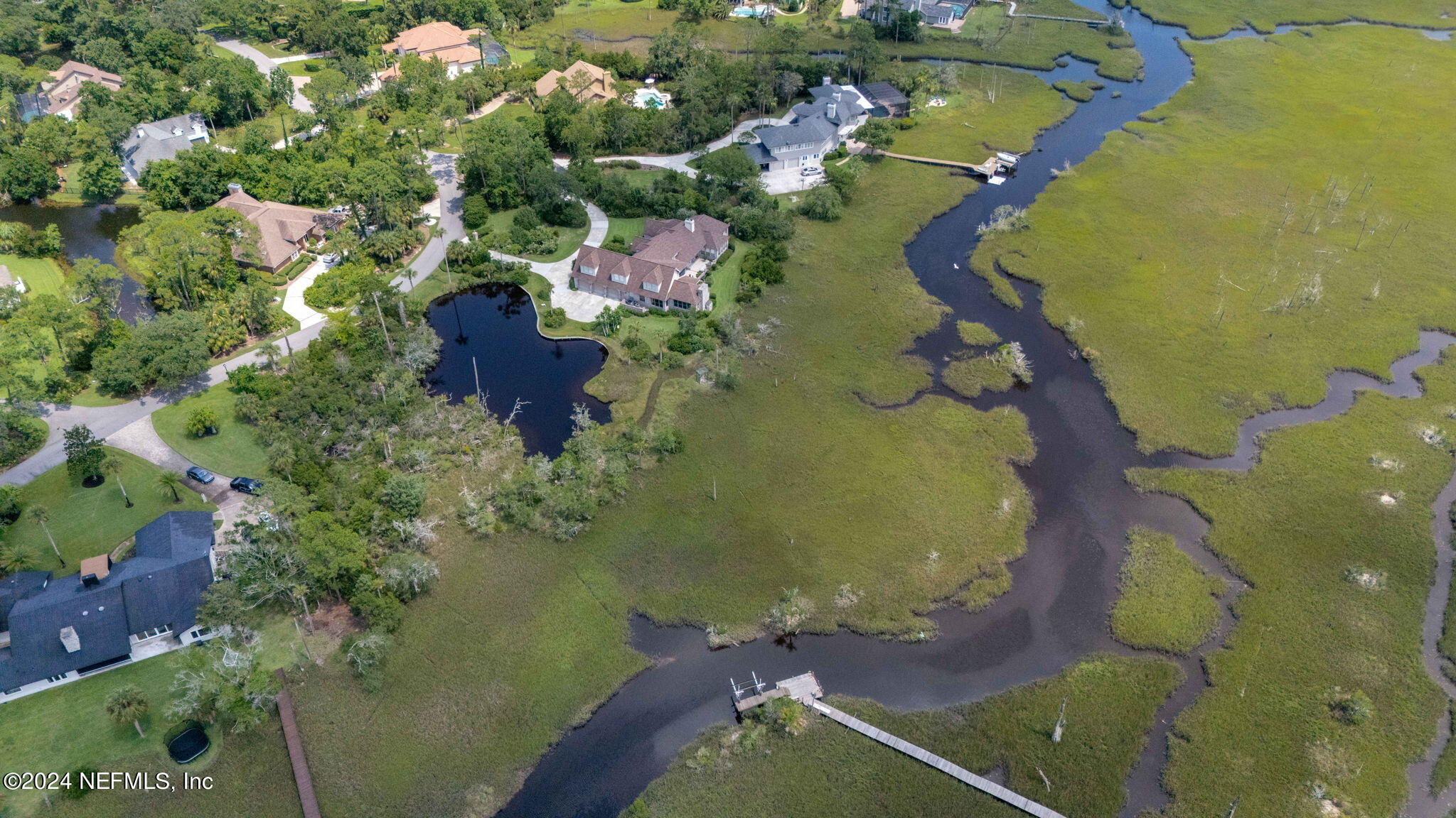 24629 Deer Trace Drive Ponte Vedra Beach, FL 32082 - Photo 14 of 45 an aerial view of residential houses with outdoor space