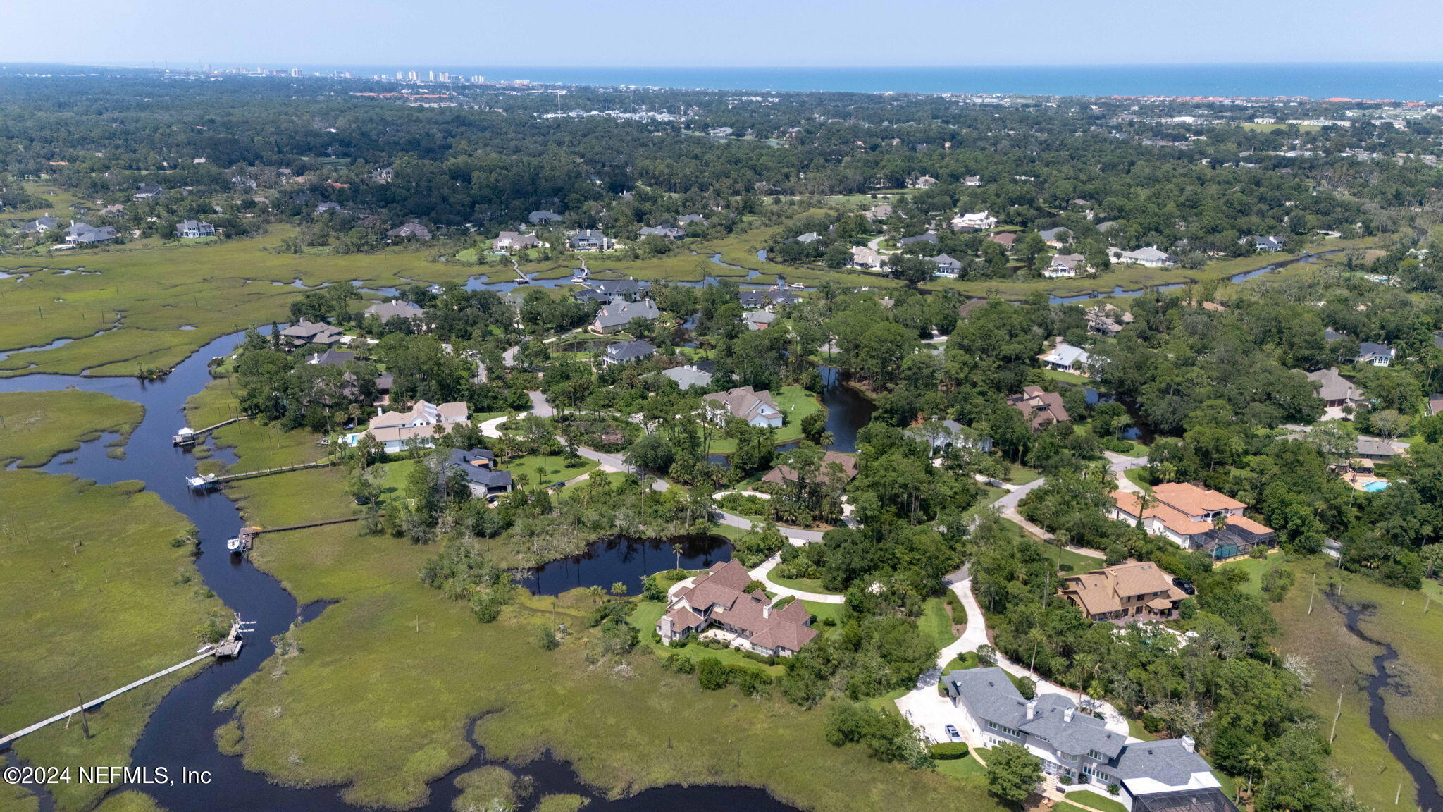 24629 Deer Trace Drive Ponte Vedra Beach, FL 32082 - Photo 15 of 45 a view of a lake with a mountain
