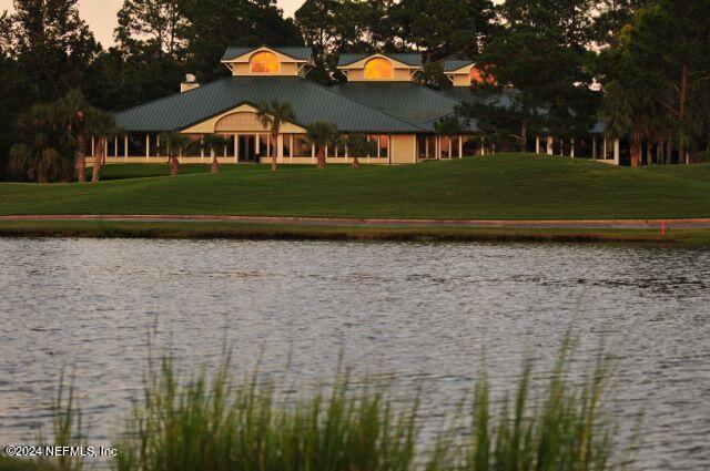 24629 Deer Trace Drive Ponte Vedra Beach, FL 32082 - Photo 40 of 45 a front view of a house with a yard