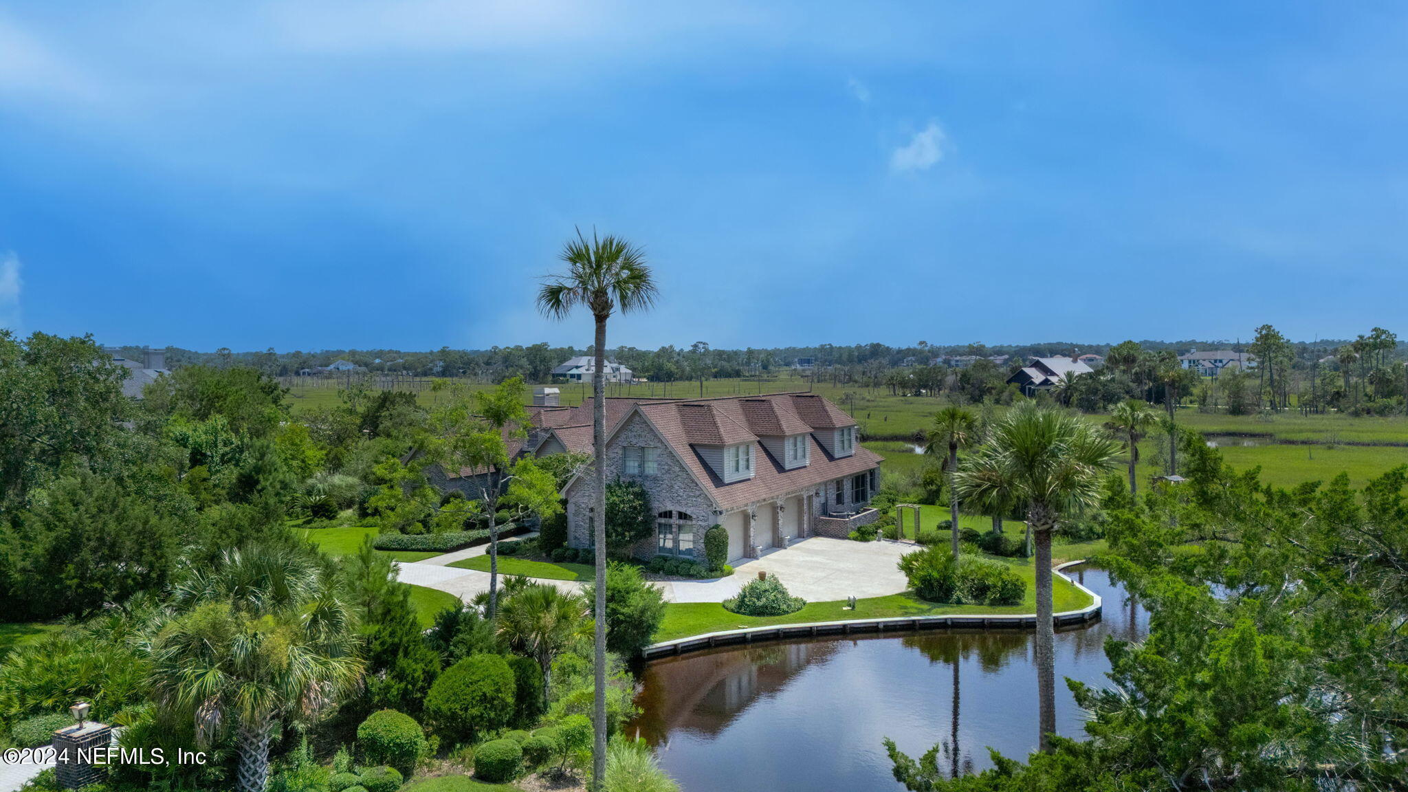24629 Deer Trace Drive Ponte Vedra Beach, FL 32082 - Photo 8 of 45 an aerial view of a house with a garden