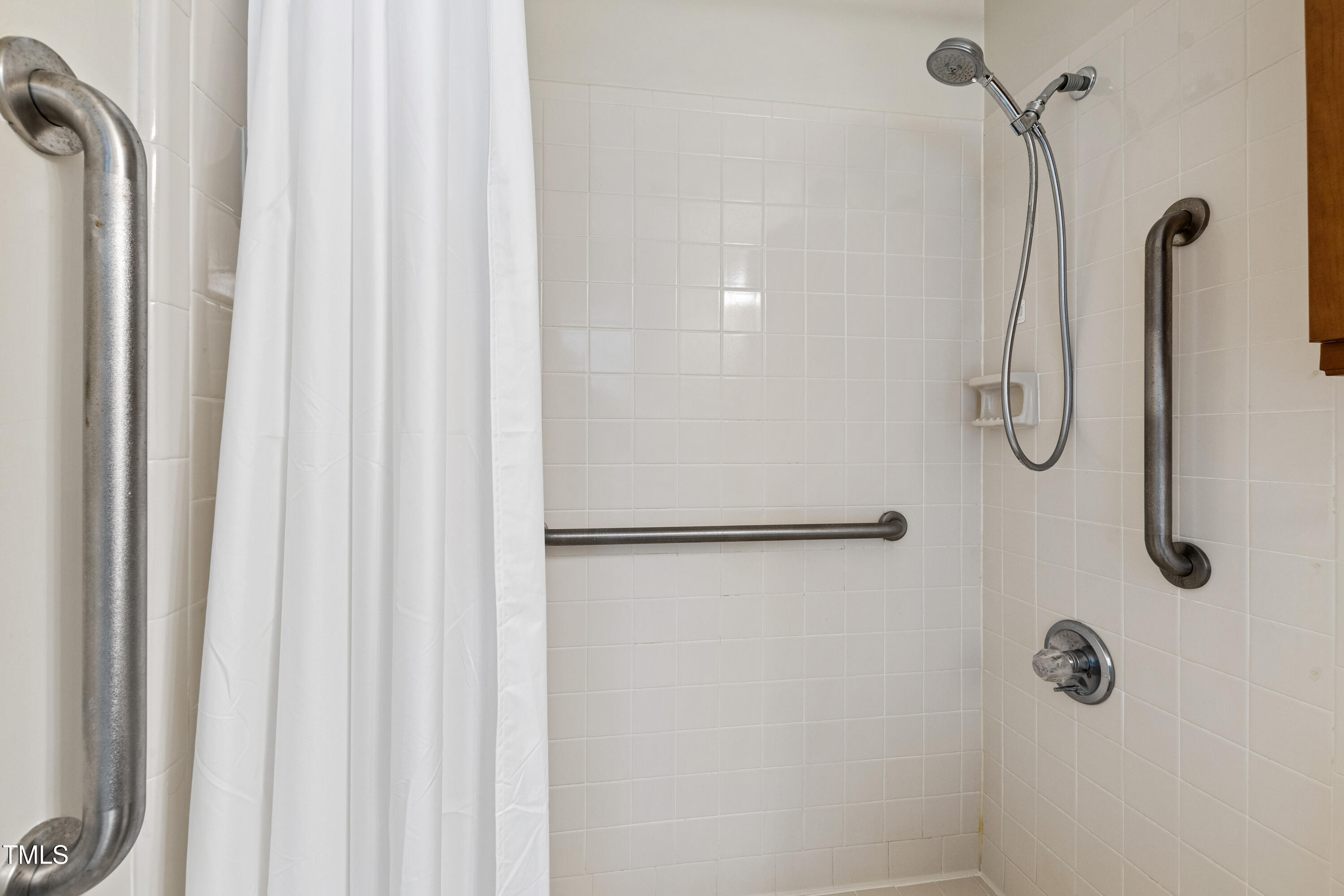 2615 Cottage Circle Raleigh, NC 27613 - Photo 18 of 27 a bathroom with a shower