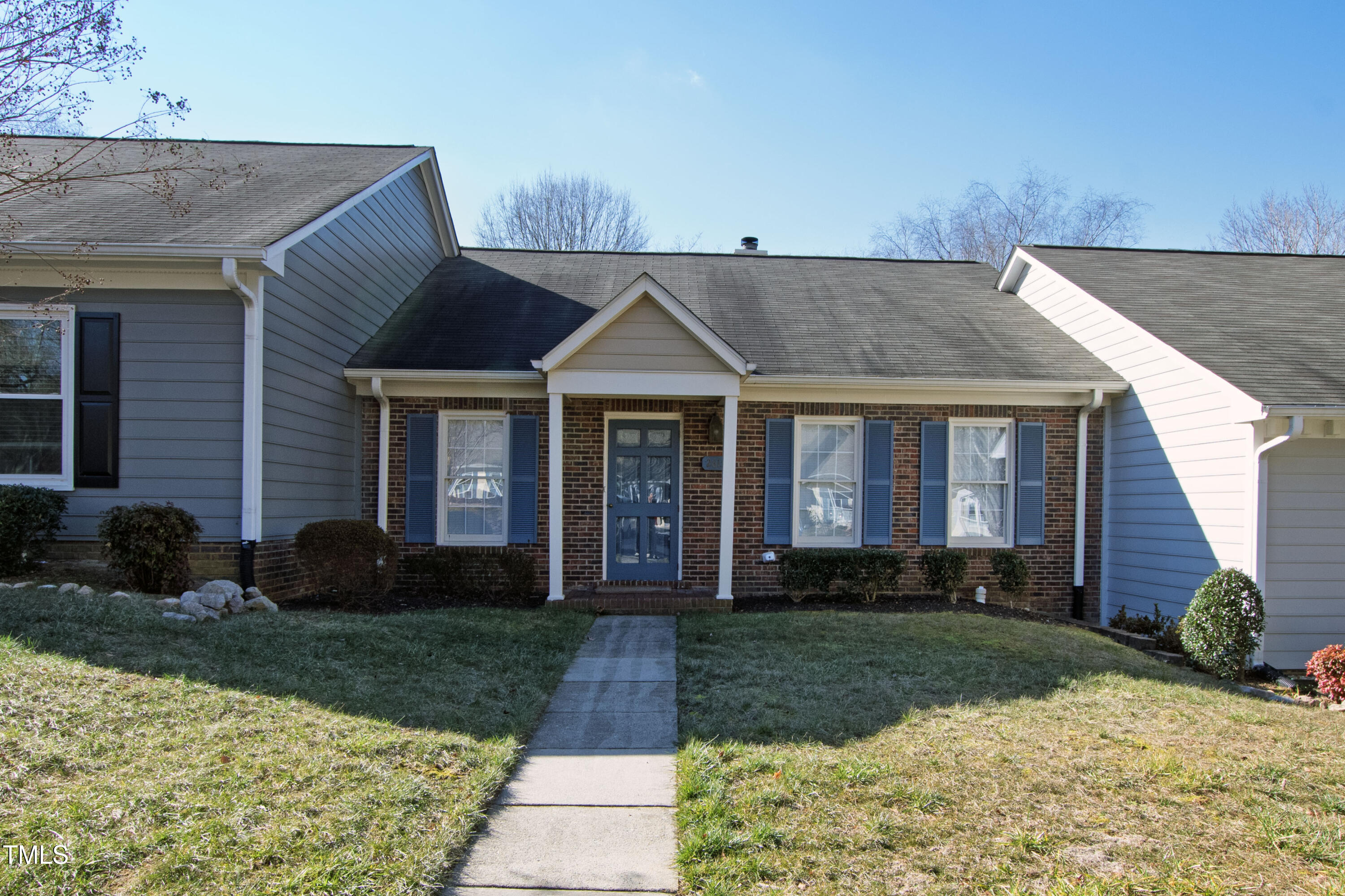 2615 Cottage Circle Raleigh, NC 27613 - Photo 2 of 27 a front view of a house with a yard