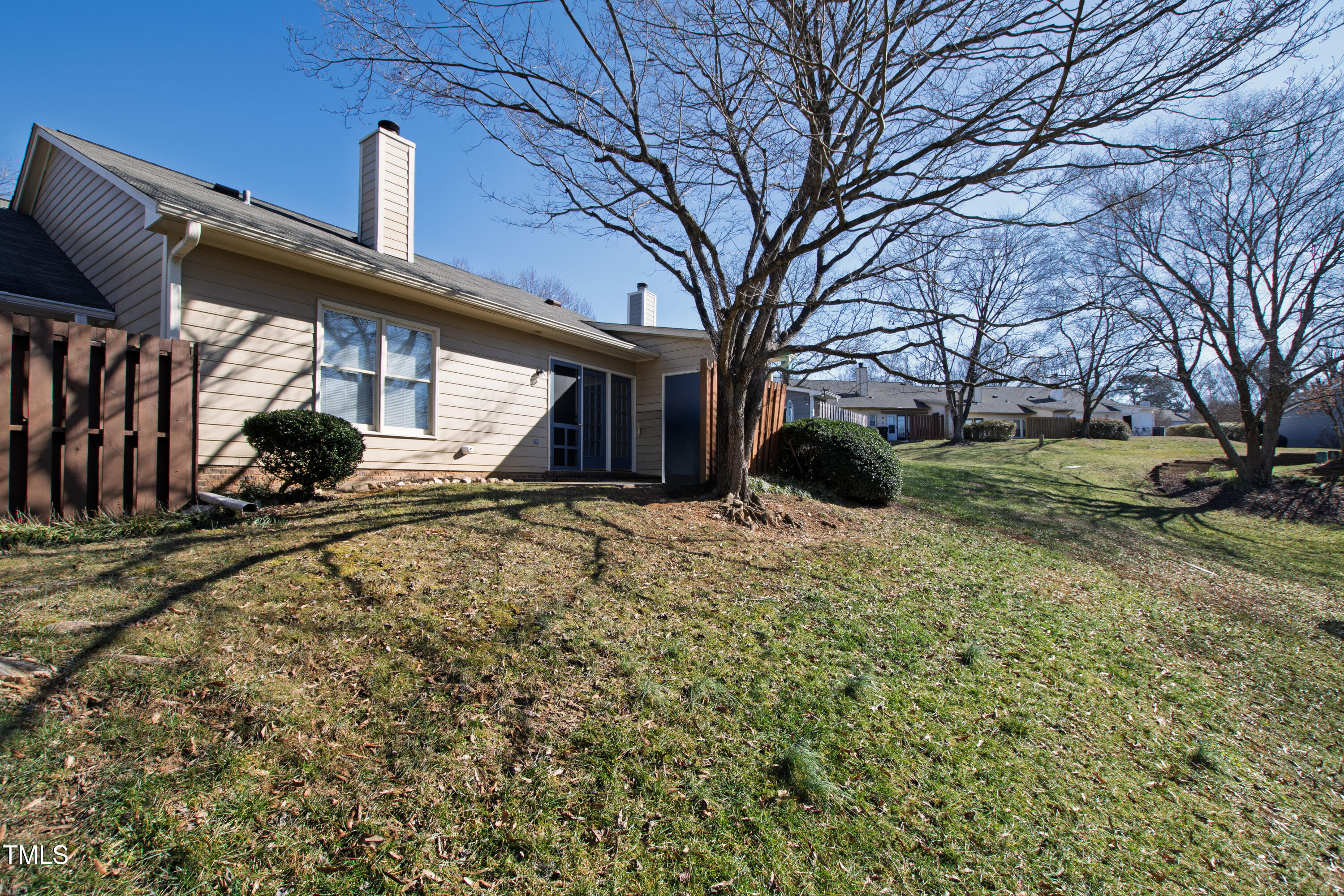 2615 Cottage Circle Raleigh, NC 27613 - Photo 24 of 27 a view of a house with a yard