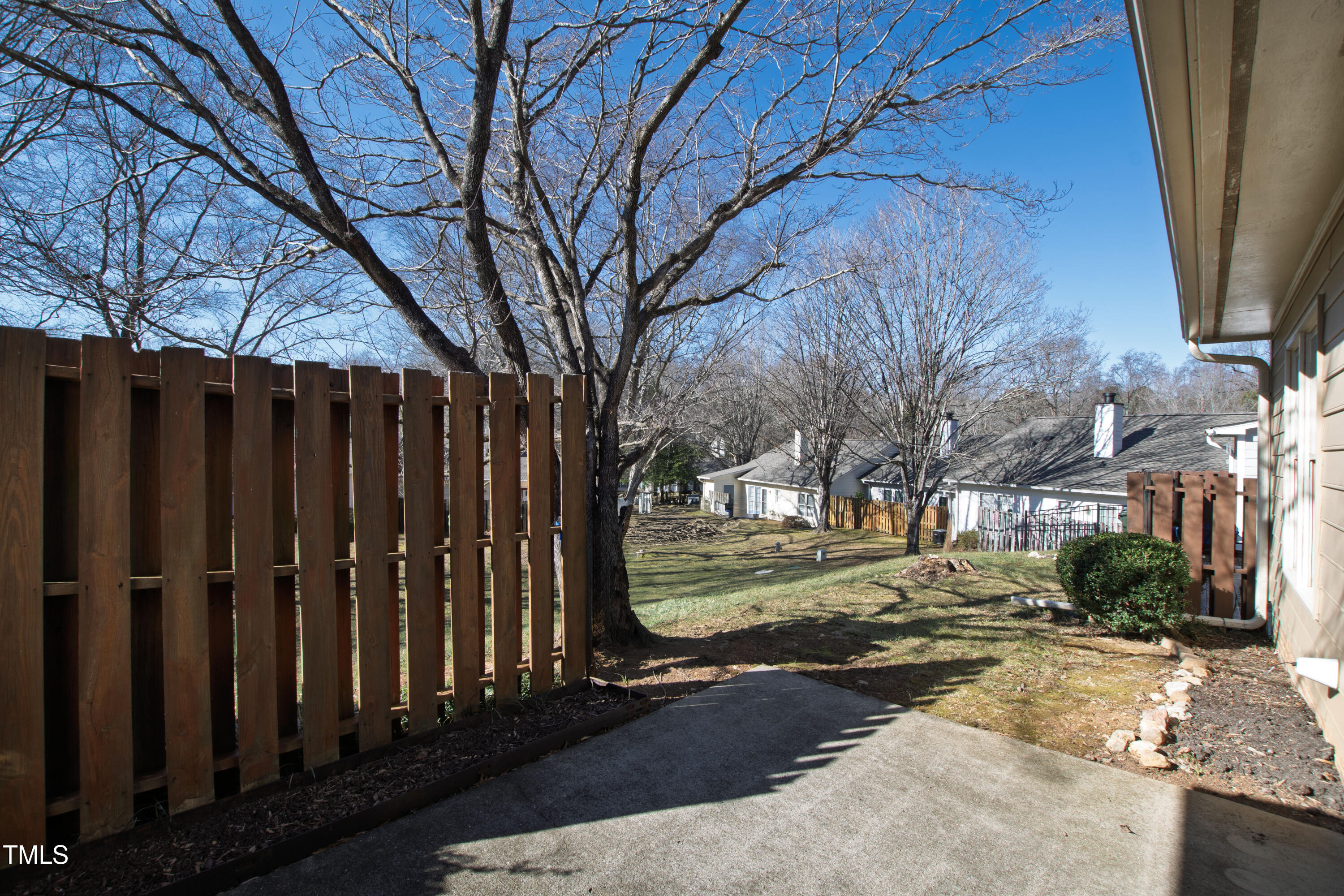 2615 Cottage Circle Raleigh, NC 27613 - Photo 25 of 27 a view of a yard with wooden fence
