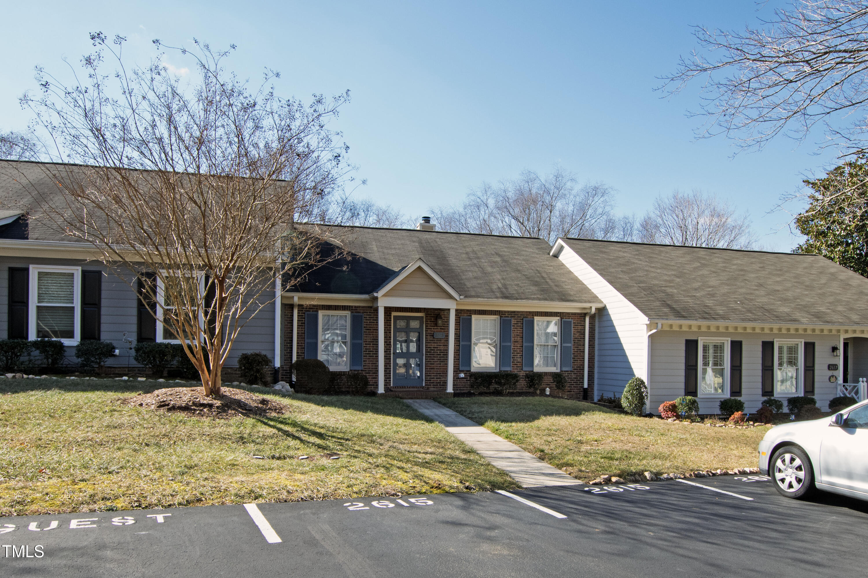 2615 Cottage Circle Raleigh, NC 27613 - Photo 27 of 27 a front view of a house with a yard