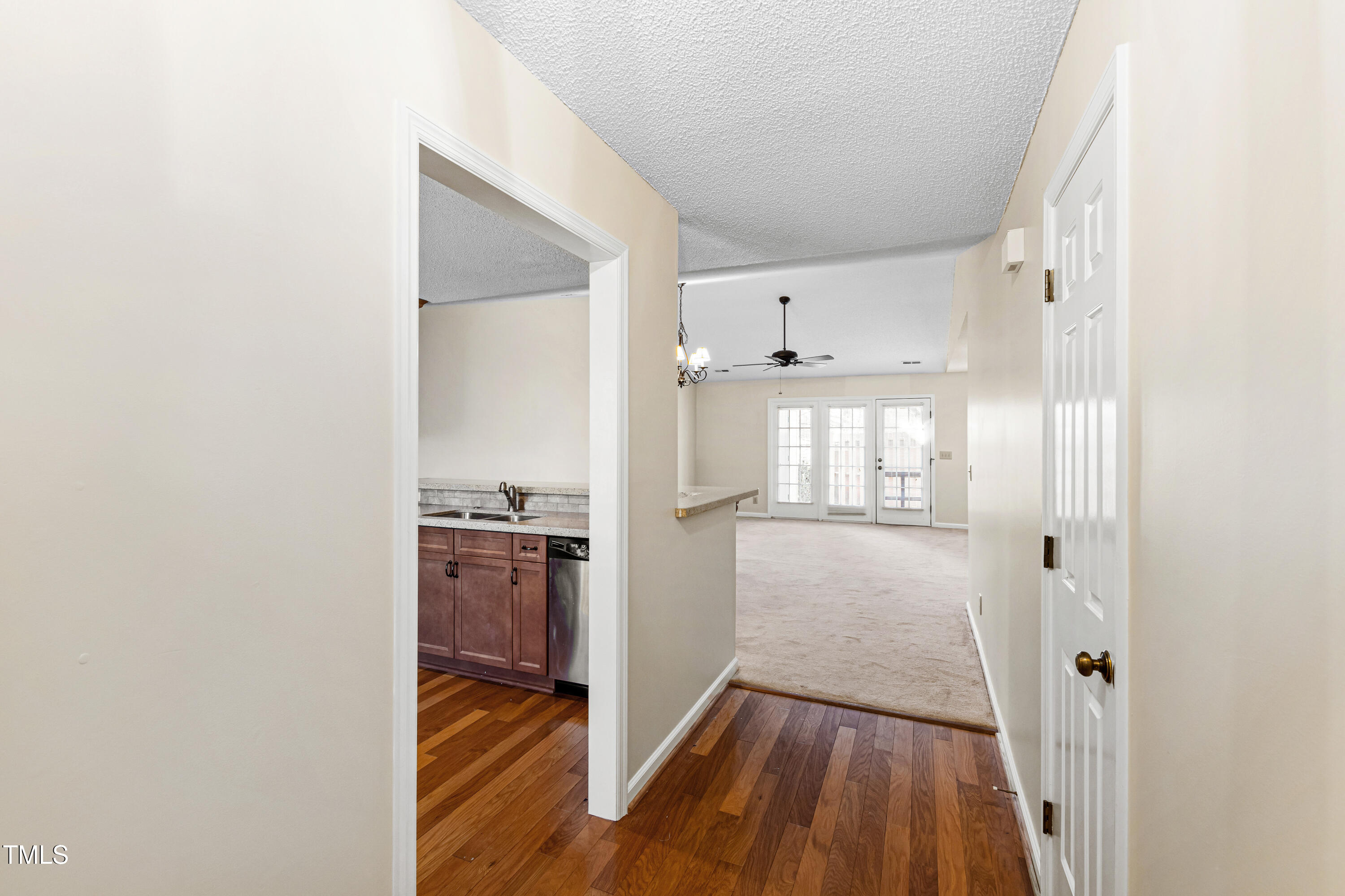 2615 Cottage Circle Raleigh, NC 27613 - Photo 5 of 27 a view of a kitchen from a hallway