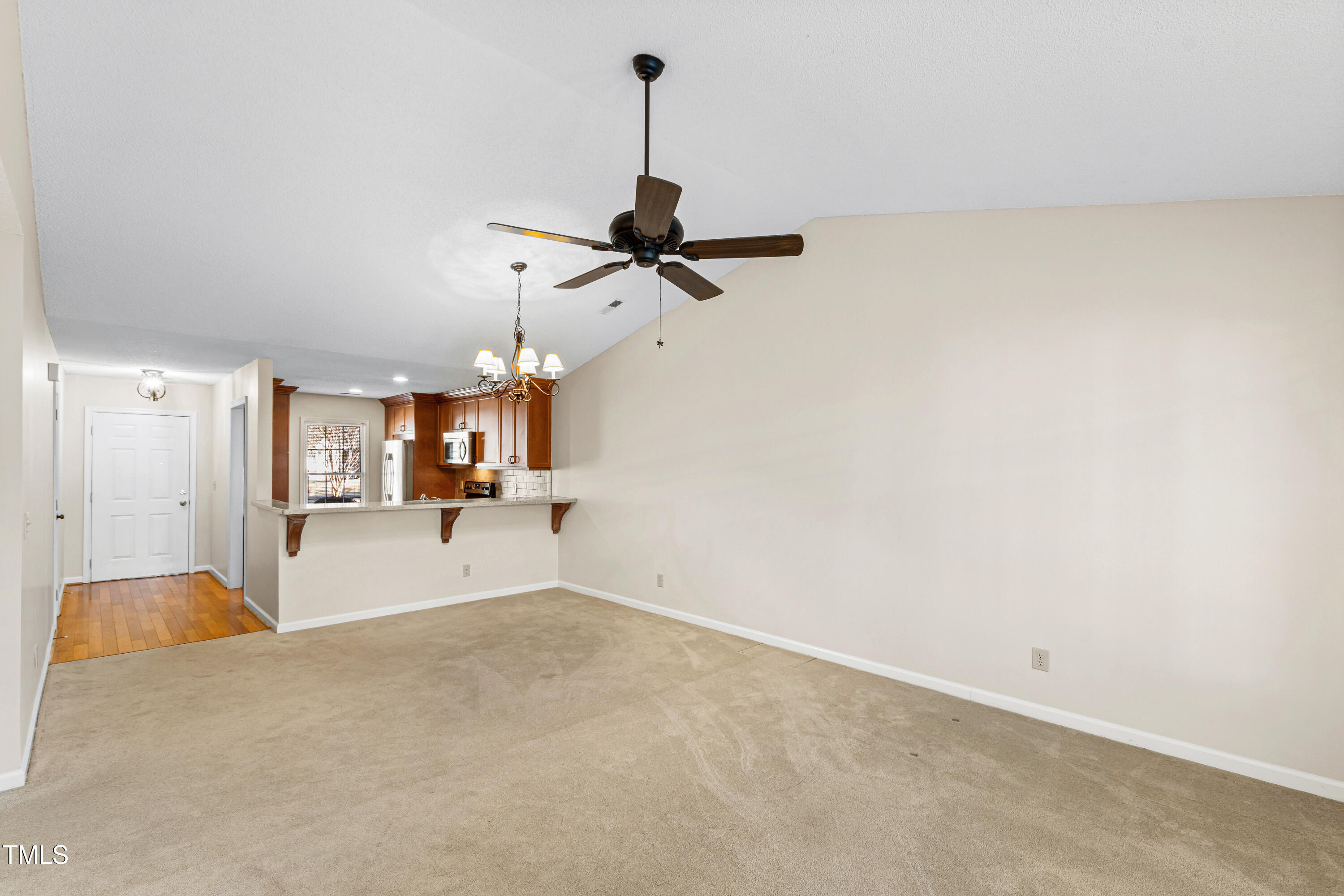 2615 Cottage Circle Raleigh, NC 27613 - Photo 10 of 27 a view of empty room with a ceiling fan