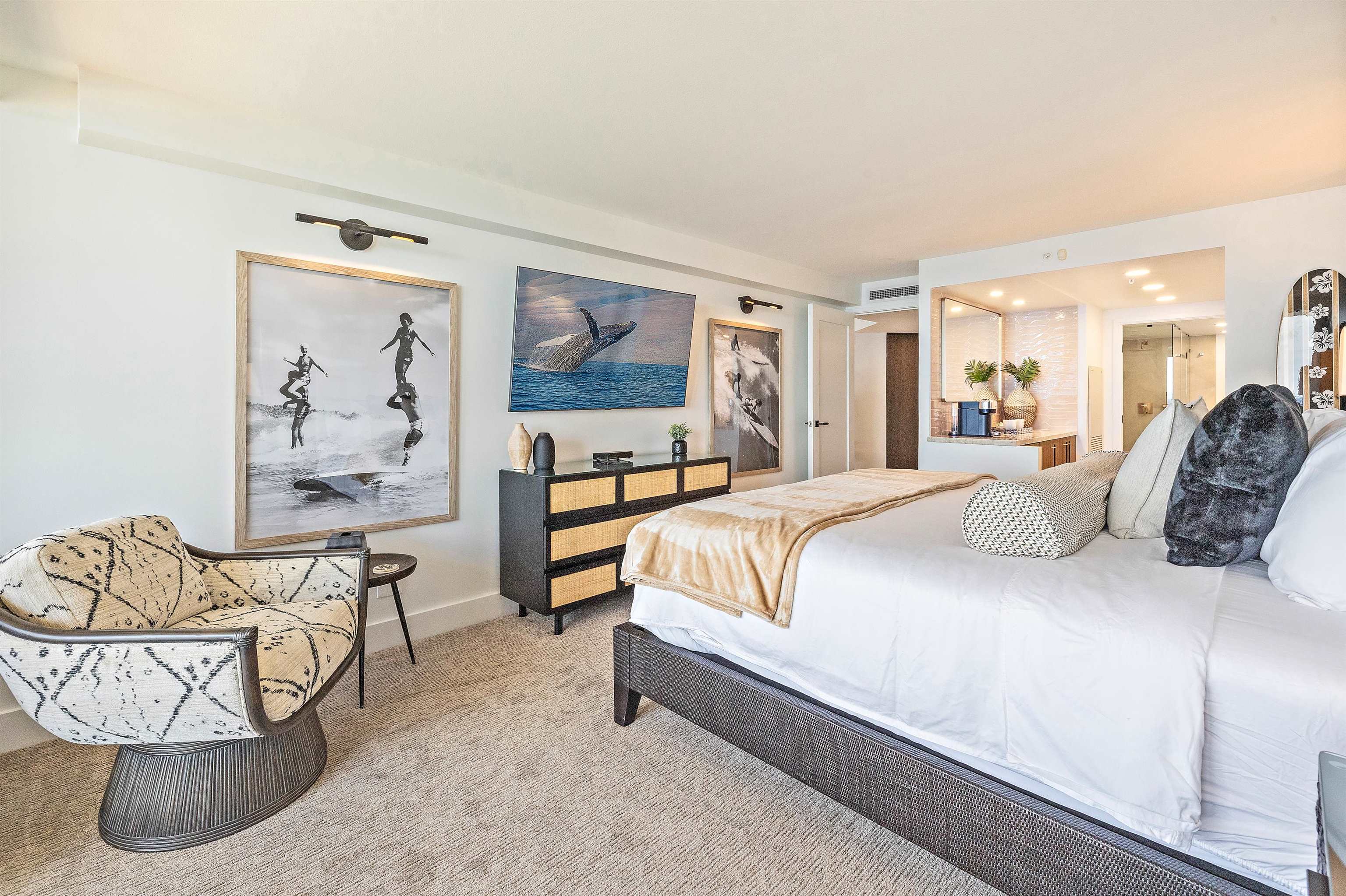 3445 Lower Honoapiilani Road, Unit 502 Lahaina, HI 96761 - Photo 27 of 50 a bedroom with a bed and glass windows