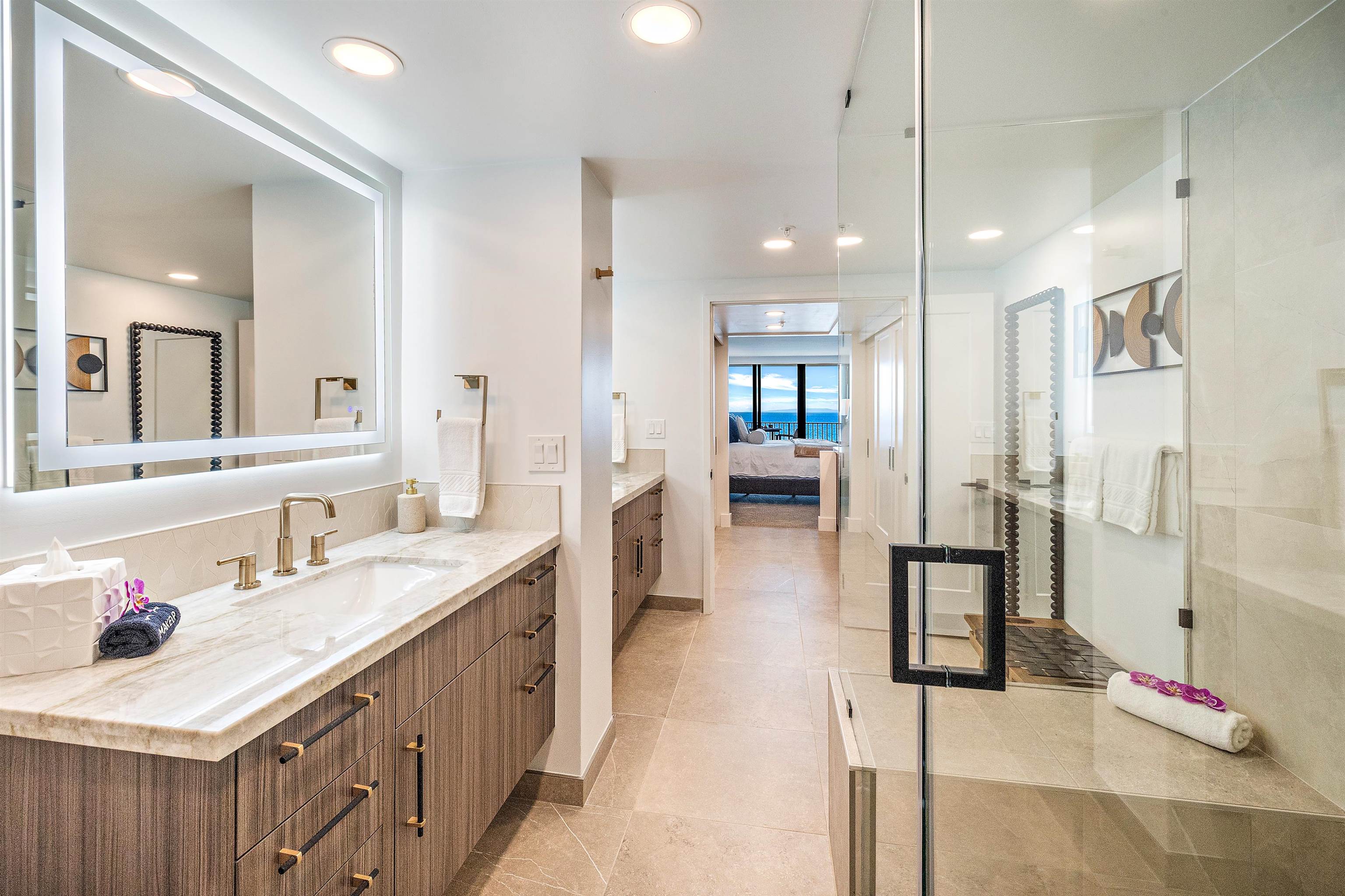 3445 Lower Honoapiilani Road, Unit 502 Lahaina, HI 96761 - Photo 34 of 50 a bathroom with a sink double vanity and shower