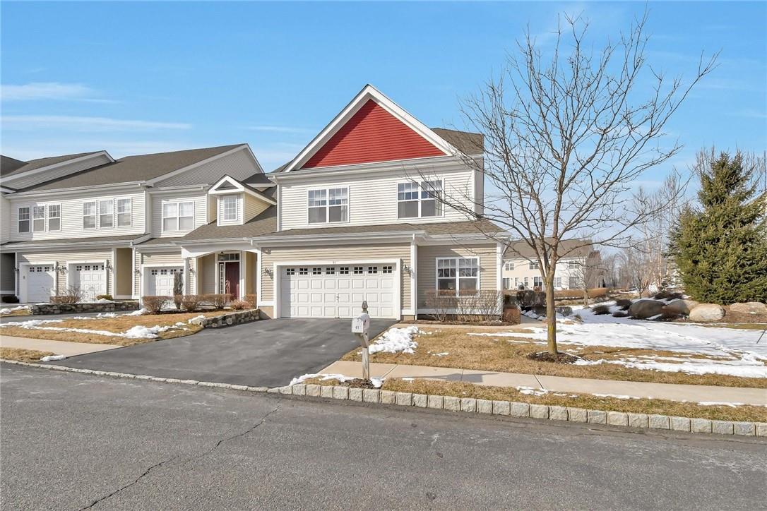 41 High Ridge Lane Middletown, NY 10940 - Photo 1 of 1 a front view of residential houses with yard and trees