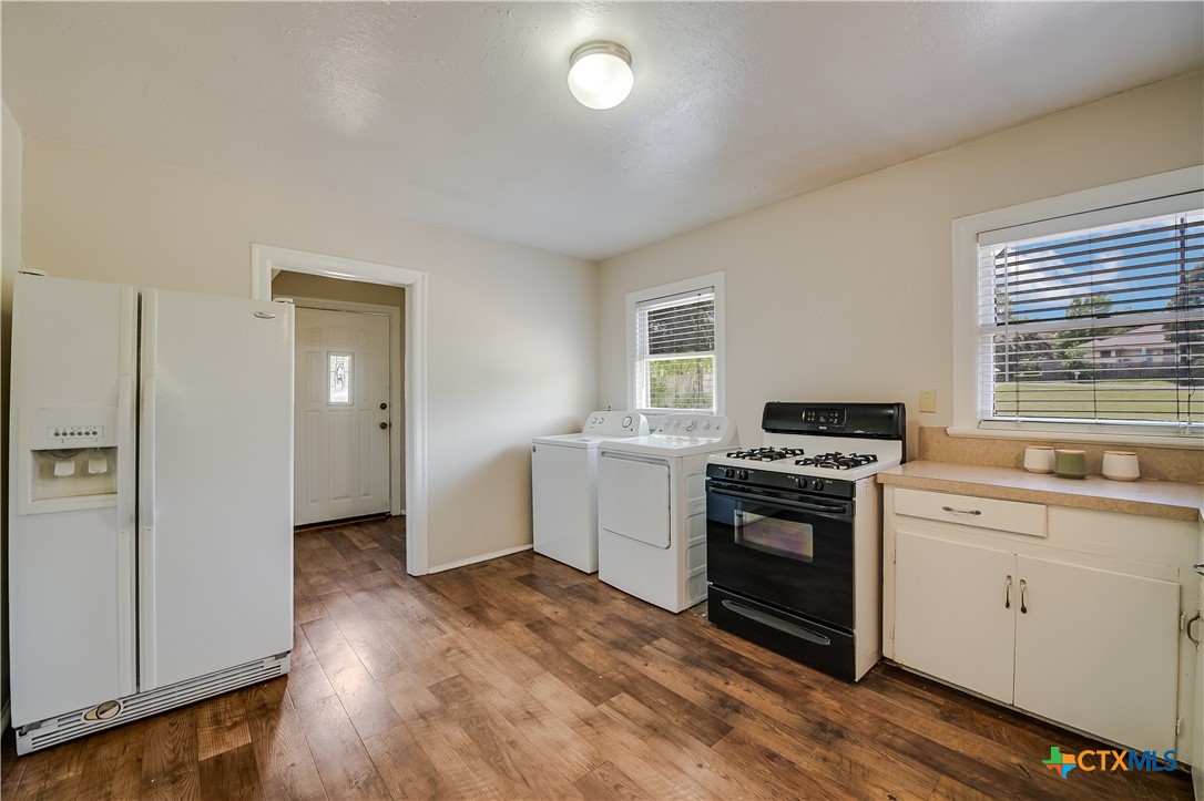 600 County Road 152 Georgetown, TX 78626 - Photo 15 of 24 a kitchen with a stove and a refrigerator