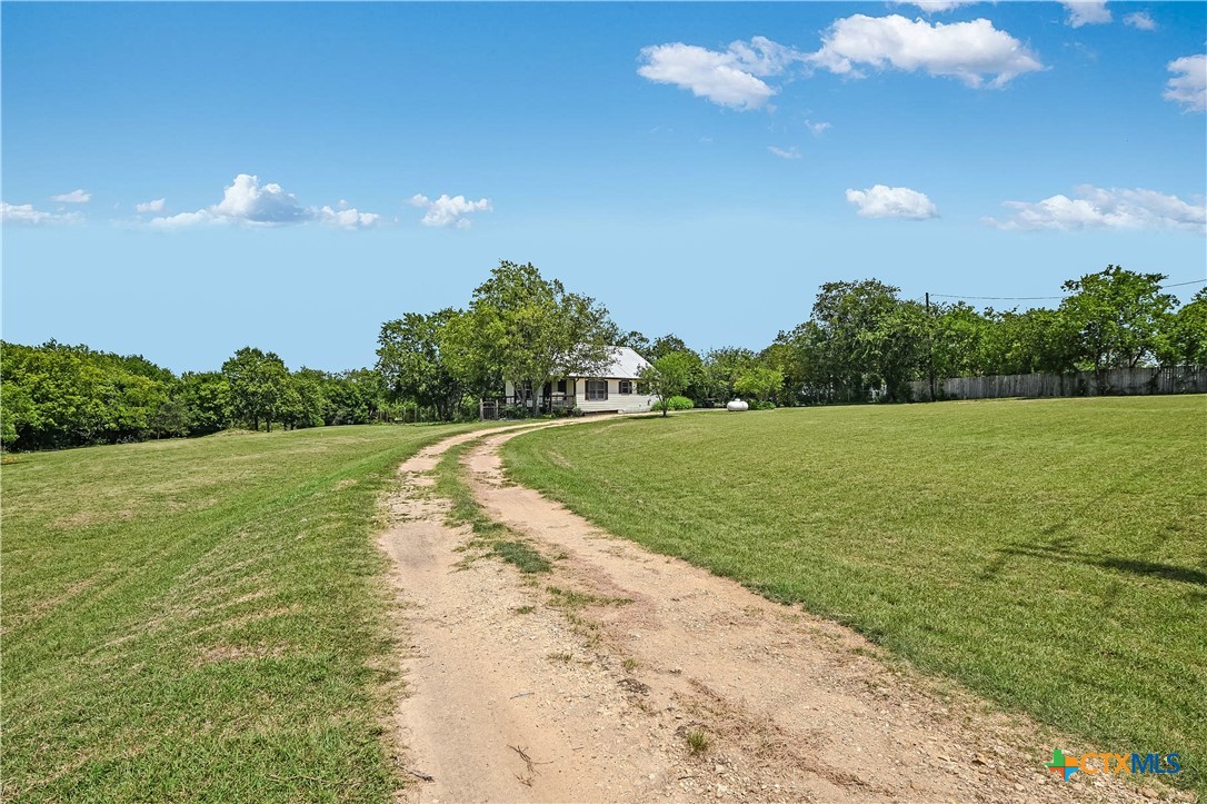 600 County Road 152 Georgetown, TX 78626 - Photo 22 of 24 a view of a lake with a big yard