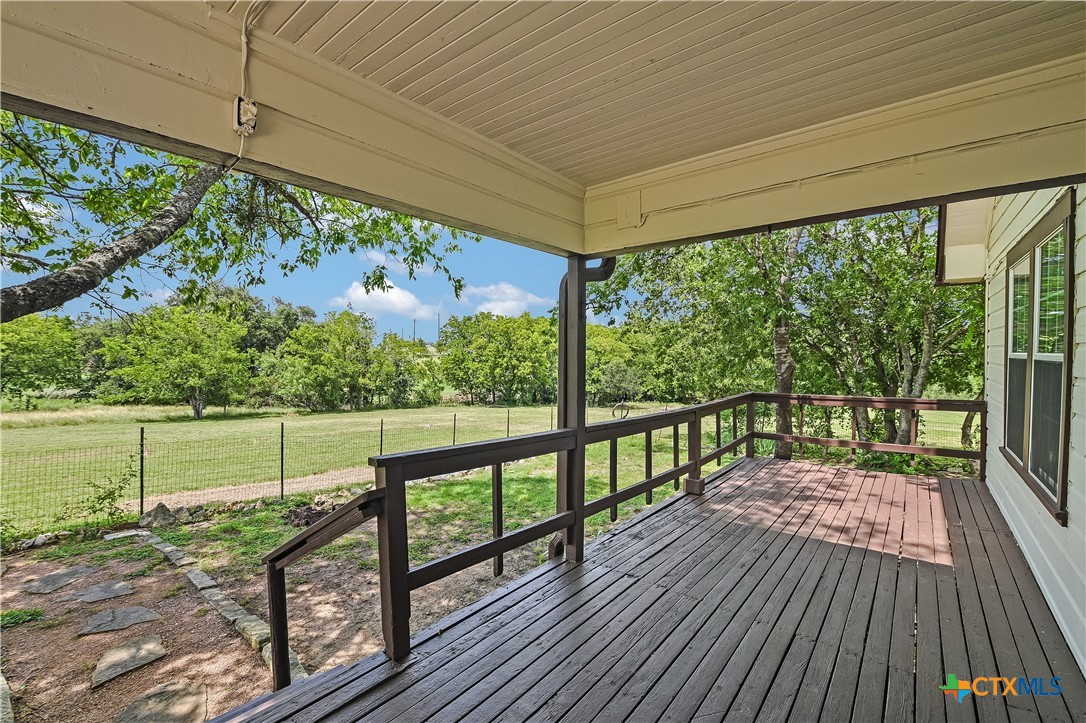 600 County Road 152 Georgetown, TX 78626 - Photo 5 of 24 a view of a porch with wooden floor and outdoor space
