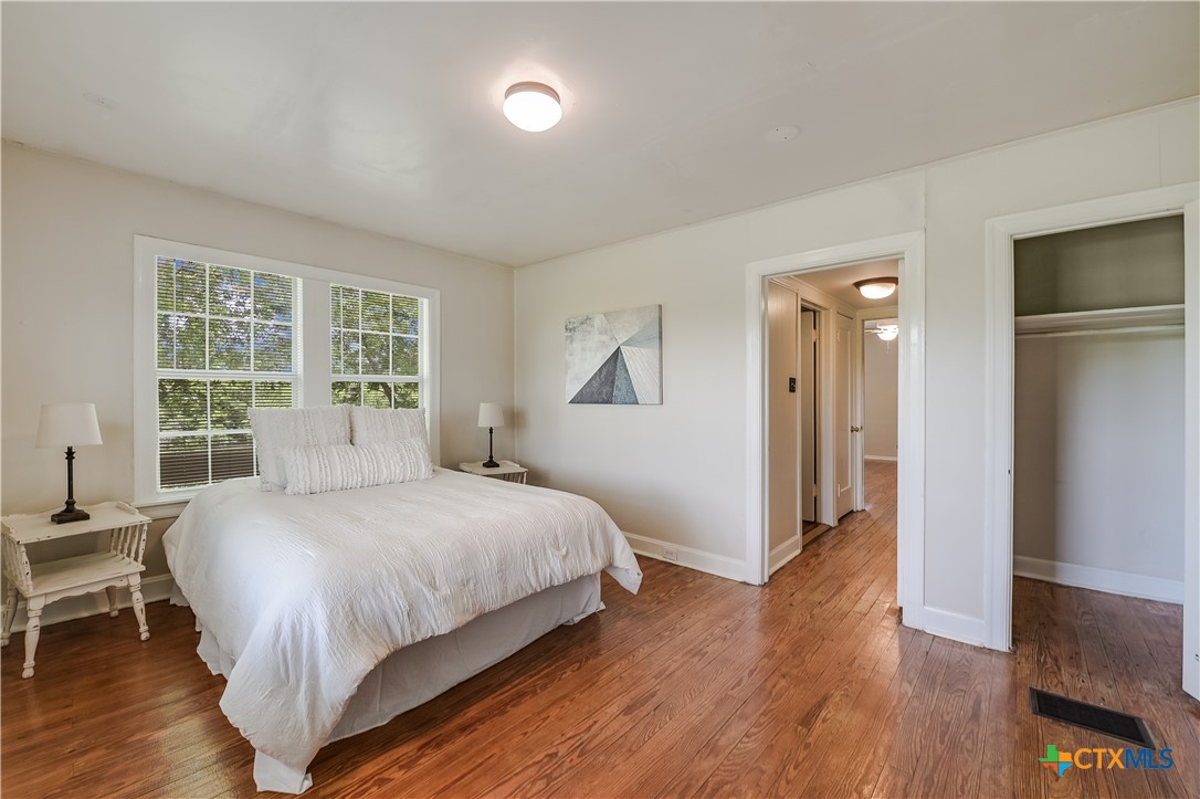 600 County Road 152 Georgetown, TX 78626 - Photo 10 of 24 a bedroom with a bed and a table