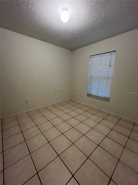 3222 Hammersmith Road Orlando, FL 32818 - Photo 14 of 17 a view of a room and window