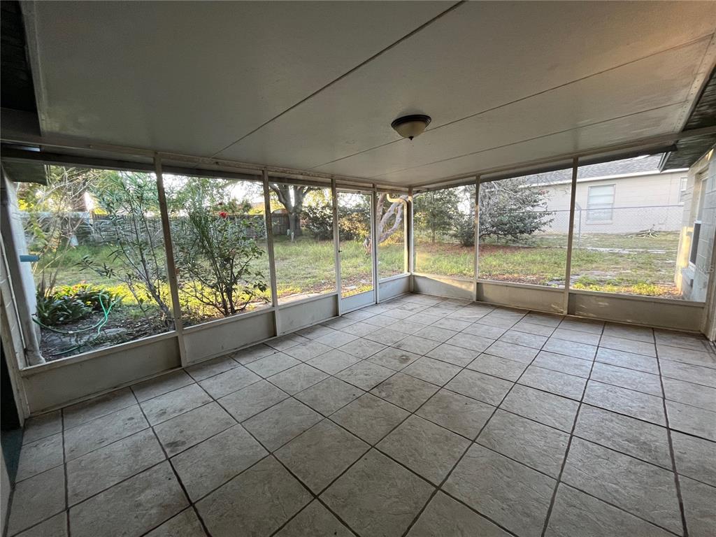 3222 Hammersmith Road Orlando, FL 32818 - Photo 17 of 17 a view of an empty room with windows