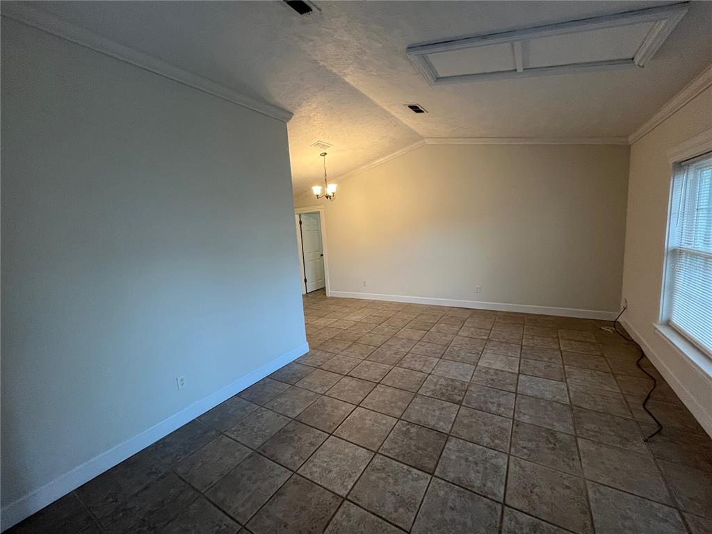 3222 Hammersmith Road Orlando, FL 32818 - Photo 2 of 17 a view of an empty room