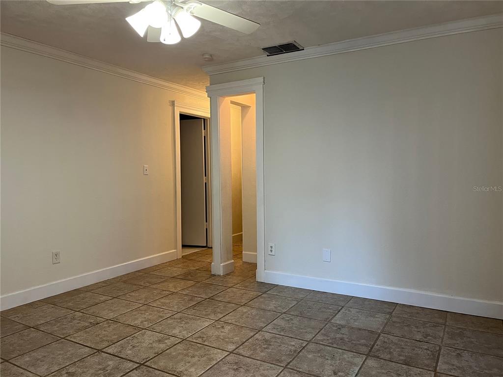 3222 Hammersmith Road Orlando, FL 32818 - Photo 5 of 17 a view of an empty room