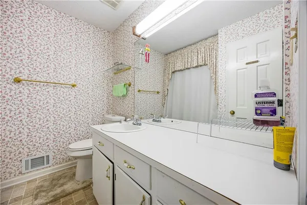 $495,000 | 297 Allen Court Southwest, Lilburn, GA 30047