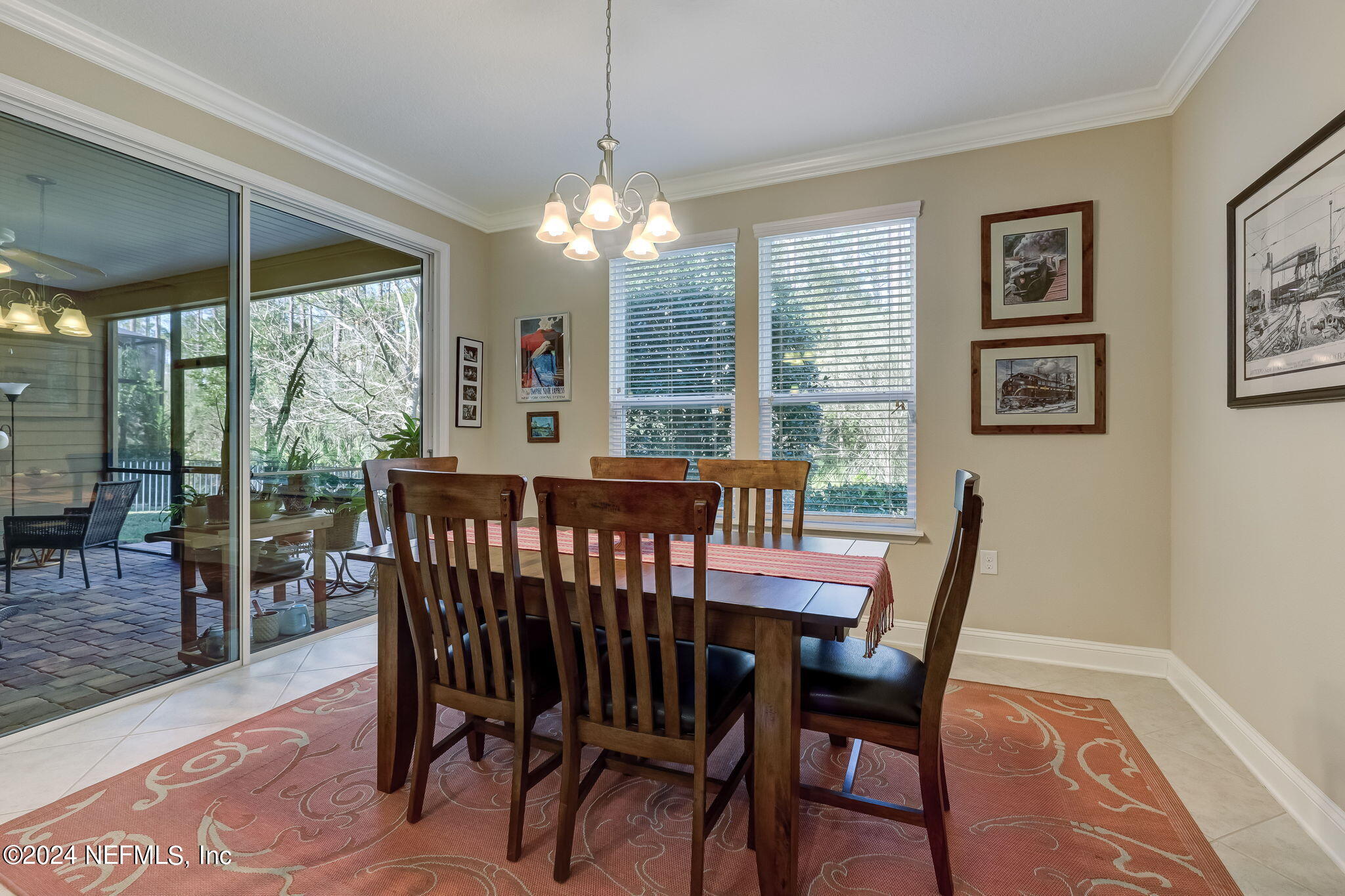 577 Aspen Leaf Drive Jacksonville, FL 32081 - Photo 13 of 106 a view of a dining room with furniture window and outside view