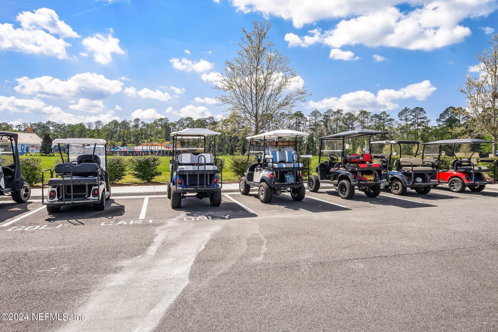 577 Aspen Leaf Drive Jacksonville, FL 32081 - Photo 77 of 106 a view of a city street with cars