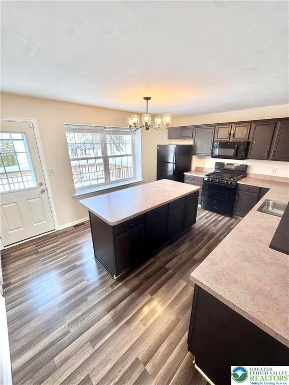 117 North Oak Street Freemansburg, PA 18017 - Photo 9 of 27 a living room with couches and chandelier