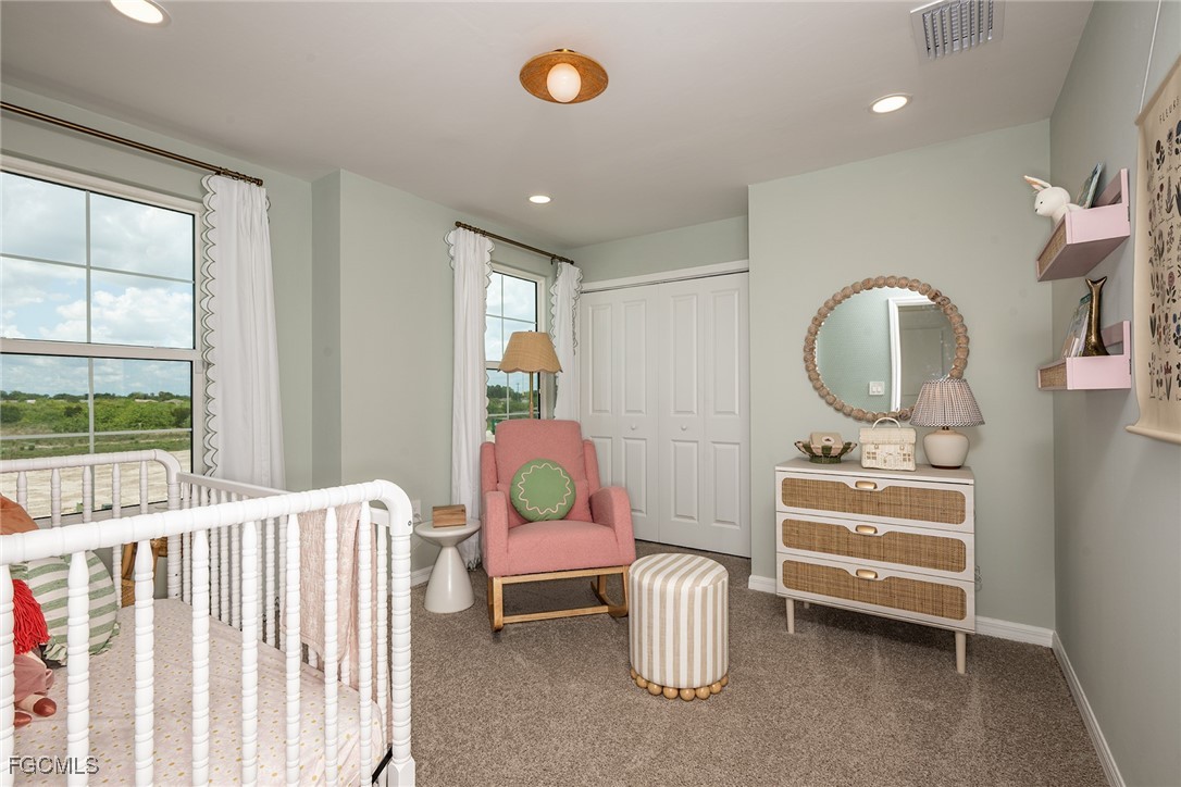 237 Moonlit Lk Trail Lehigh Acres, FL 33974 - Photo 14 of 18 a living room with furniture and a window