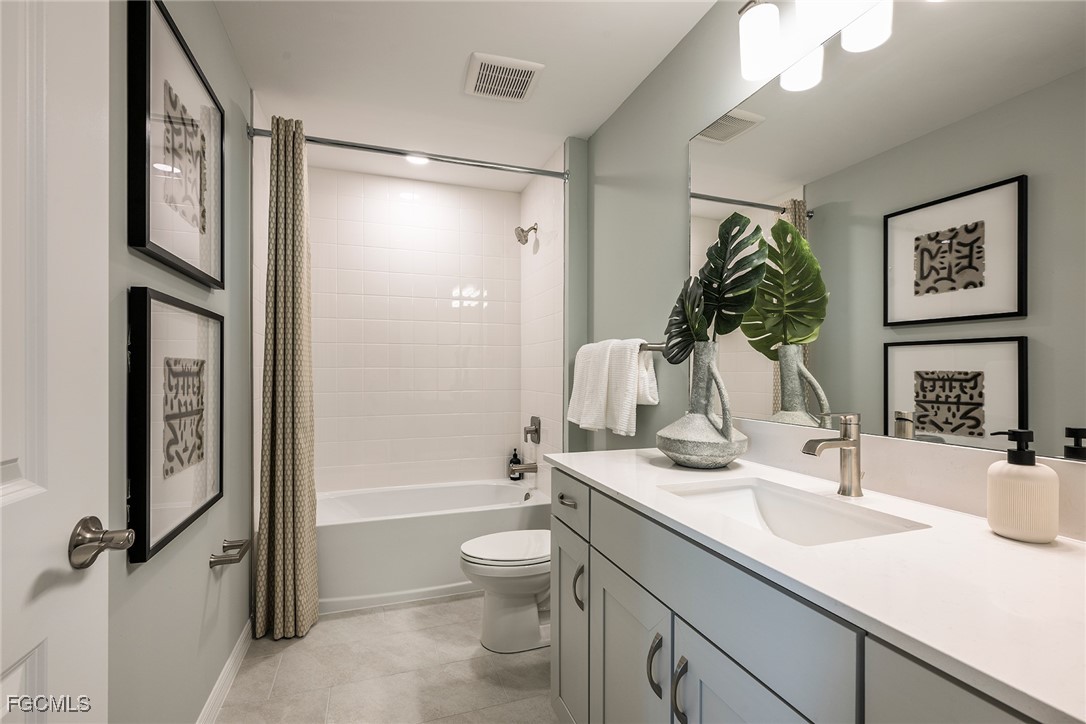 237 Moonlit Lk Trail Lehigh Acres, FL 33974 - Photo 15 of 18 a bathroom with a granite countertop sink toilet and shower